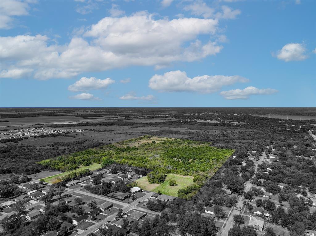Beautiful 26.38-acre tract located in Greenville, Texas — an incredible opportunity for residential development in one of the area’s fastest-growing corridors. Zoned for single-family homes, this property is already platted into 24 individual lots along College Street, Wellington Street, and Langford Street, ranging in size from approximately 0.17 acres to over 15 acres. This diverse layout offers flexibility for various home types or phased development. All major utilities are available on-site, including city water, septic, gas, and electric. Conveniently located just one mile from the intersection of US-69 and US-380, residents will enjoy easy access to nearby shopping, dining, and major highways while still experiencing a peaceful, suburban setting. With over three access points and no floodplain impact, this land is ready for efficient site design and build-out. Whether you’re a builder ready to create a new community or an investor seeking long-term growth potential, this property provides the perfect blend of location, infrastructure, and opportunity.
