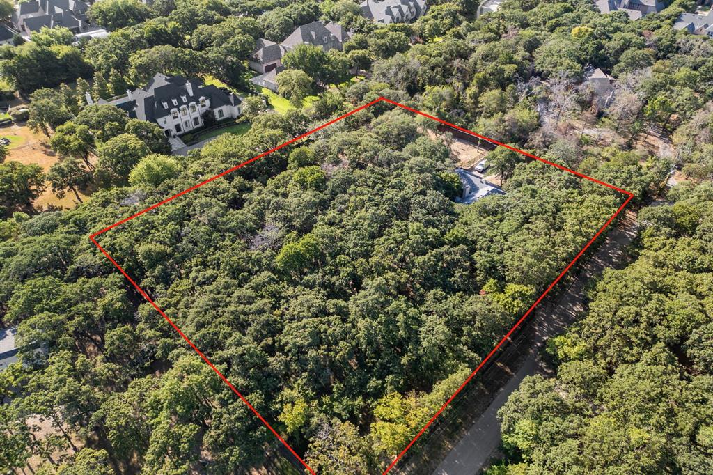 Rare opportunity to own 1.91 acres in the highly sought-after Carroll ISD with no HOA. This private property sits on a quiet street and features a circular driveway, offering an ideal setting for a future luxury estate. The lot provides ample space and flexibility to build a custom home with the builder of your choice or renovate the existing residence. Surrounding estate homes on Brown Lane highlight the area's continued redevelopment and strong demand for new luxury construction. The existing home will require renovation and is being sold as-is. Property currently operates on septic, and city water and sewer connections are being installed in the area, adding long-term value and convenience. A rare chance to secure acreage in one of Southlake’s most desirable locations