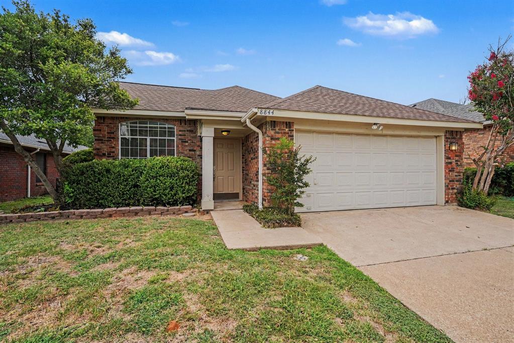 Welcome to this charming three-bedroom, two-bathroom home located in the desirable River Trails Add neighborhood.This home features a classic traditional floorplan that offers distinct and comfortable living spaces. The inviting interior highlights a cozy fireplace as the focal point of the living room, perfect for relaxing evenings at home. The kitchen is highly functional, featuring durable laminate countertops paired with sleek stainless steel appliances. Step outside to find a private, fully fenced-in backyard, providing an excellent and secure space for outdoor entertaining, gardening, or weekend barbecues.This location is highly convenient, with endless shopping, dining, and sporting venues nearby. For commuters and frequent travelers, the property is situated approximately 15 miles to DFW International Airport, with quick access to Loop 820 and I-30. Additionally, residents can enjoy a walkable and bike-friendly route to the nearby elementary school.  Schedule your private showing today!