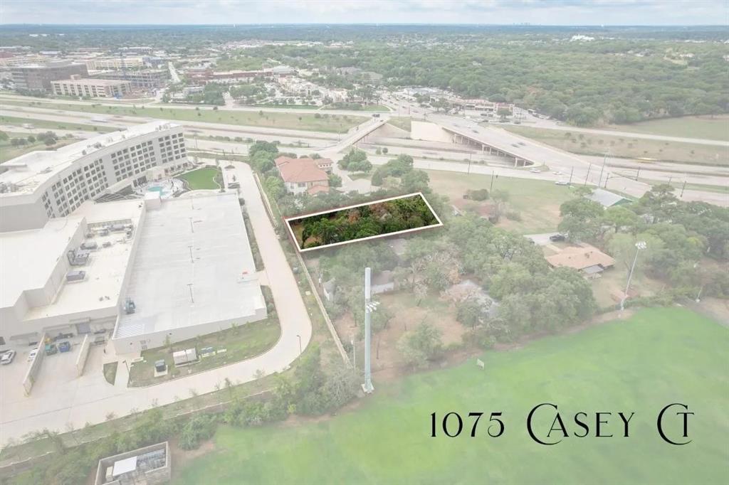 Tucked on a private road behind one of Southlake's most recognizable landmarks, this half-acre lot carries the quiet confidence of land that knows its own worth. Towering post oaks frame a generous, open canvas — cleared and ready — while aerial views reveal what the address alone doesn't say: the Westin Dallas Southlake sits at your back fence, SH-114 is steps away, and 151,000+ daily drivers pass within sight. Carroll ISD. No HOA. On-site septic. This is Southlake's last quietly positioned acreage at the intersection of residential calm and commercial gravity. Build it, hold it, or assemble it — the land makes the case either way.