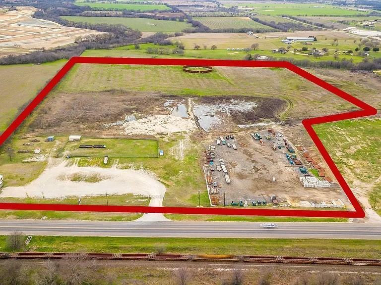 Great Industrial-Multi Family-Single Family Development opportunity!!! 35 acres with a double wide mobile office building. Office building includes an executive office with private full bath, 2 other offices, copy room, employee bathroom, conference room, full kitchen, break room, and a receptionist area. Conveniently located off FM-156 just 5 miles north of TX-114 and just minutes from the Texas Motor Speedway. Property consists of 15 Parcel ID #'s: R523581, R523584, R523578, R68569, R523583, R523582, R208152, R223331, R70703, R208276, R223335, R523574, R523575, R208275, and R223333. Located in Northlake ETJ not subject to zoning restrictions. Close proximity to I35W and SH-114. Northwest ISD