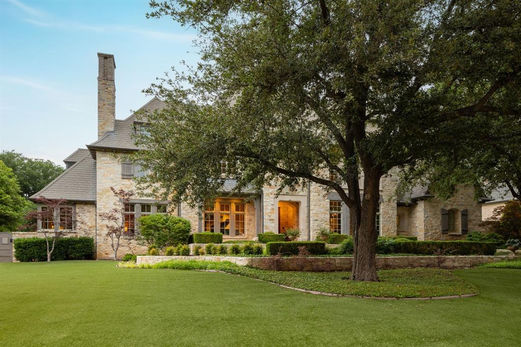 Nestled within the prestigious guard-gated enclave of Glen Abbey, discover the grandeur of this exquisite French Country estate crafted by renowned builder Joe Kain. Meticulous attention to detail is evident throughout, boasting stunning stonework and reclaimed antique light oak floors that grace the interiors. Elegant formals, a refined study, and a chef's kitchen epitomize luxury living. A downstairs second master and three en suite bedrooms upstairs offer opulent retreats. The fully finished third floor presents endless possibilities, including elevator installation potential. Outside, a private backyard oasis awaits with a sport court, sparkling pool, and spa, enveloped in lush landscaping. Designed by the esteemed Fusch-Serold & Partners Architects, this exceptional residence epitomizes unparalleled quality and timeless elegance.