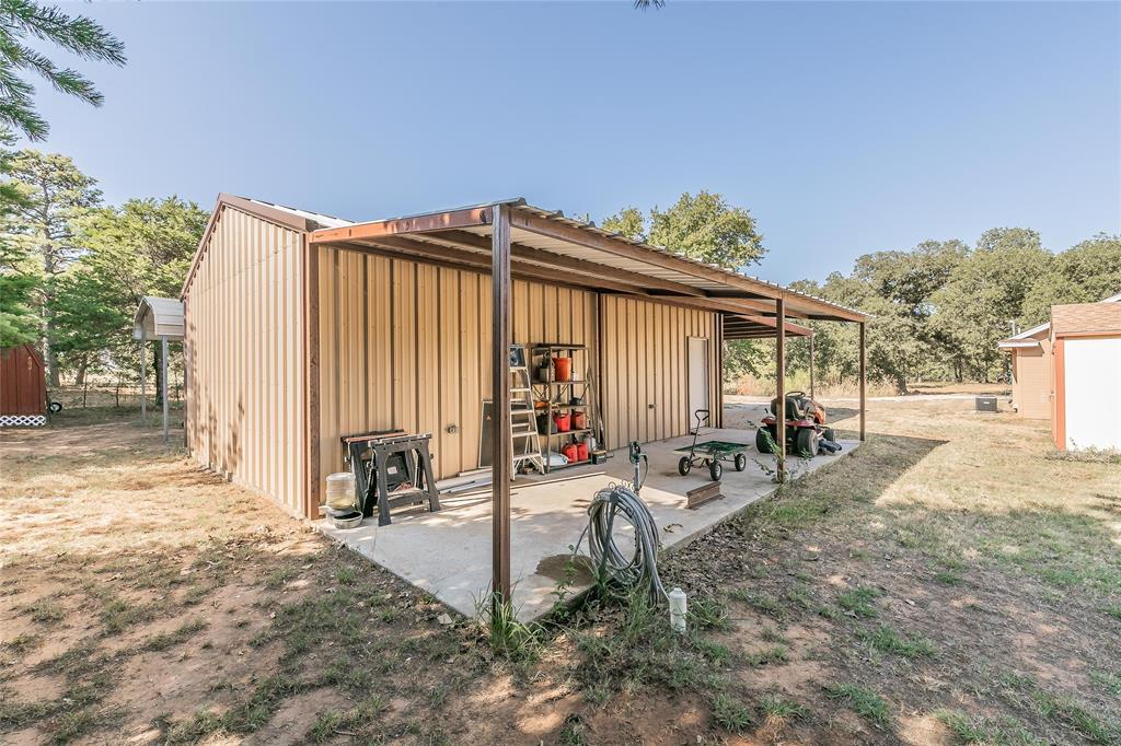 Welcome to your private Homestead on 1.5 acres with a 24 x 30 SHOP with electricity and is plumbed for water and sewer, along with a ready to go chicken coop and a NEW Tuff Shed. RV Hook up. Come check out all this property has to offer. You will feel right at home when you step into this home, the kitchen is equipped with a fairly new refrigerator, stainless steel appliances and granite countertops. The living area has a wood burning fireplace with a wood mantel. The stackable washer and dryer will stay with the property. Enjoy the evening sunsets from your front pouch.