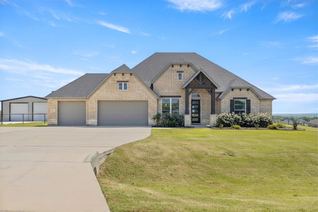 Stunning 2022 build by Our Country Homes offering 4 bedrooms, 2.5 baths, 2,512 sqft, plus game room and dedicated office—perfectly designed for both everyday living and entertaining. Step outside to your private backyard oasis featuring a sparkling pool with waterfall, tanning ledge, and upgraded UV chlorine system for a more enjoyable, low-chemical experience. The pool deck is complete with a child safety fence, and a beautiful gazebo provides the perfect space to relax and take in the gorgeous views. The fully fenced yard with mature trees offers both privacy and room to enjoy the outdoors. For those needing extra space, the impressive 900 sqft shop with electrical is ideal for hobbies, storage, or a workspace. Additional highlights include a security system and roofline lighting—perfect for holidays and year-round curb appeal. This property truly has it all—modern construction, functional layout, and resort-style outdoor living in a peaceful setting.