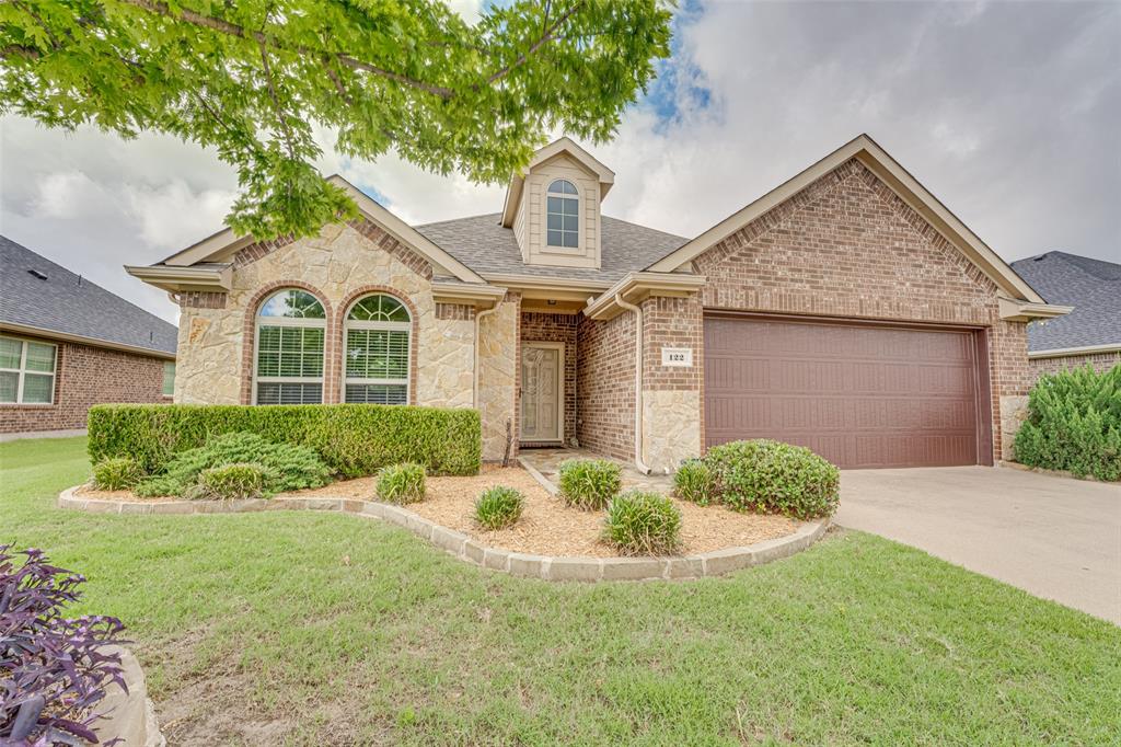 Welcome to this beautifully maintained 3-bedroom, 2-bath home in the desirable Arbors at Willow Grove community in Waxahachie, TX. Featuring a NEW roof and NEW HVAC system, this move-in-ready home offers peace of mind, energy efficiency, and exceptional value. The sought-after split-bedroom floor plan provides privacy for the primary suite while maintaining an open-concept layout ideal for everyday living and entertaining. Rich hardwood flooring enhances the main living areas, while large windows throughout fill the home with natural light and showcase views of the beautifully landscaped front and backyard. The spacious living room flows seamlessly into the kitchen and eat-in dining area, creating a welcoming gathering space for family and friends. The kitchen features granite countertops, stainless steel appliances, a walk-in pantry, ample cabinetry, and functional workspace for meal preparation and hosting. The private primary suite serves as a relaxing retreat, while the secondary bedrooms are thoughtfully positioned on the opposite side of the home for added separation and flexibility. Outdoor living is a standout feature of this property. A charming flagstone entry welcomes you home, while the beautifully landscaped front and backyard create outstanding curb appeal and a peaceful outdoor setting. Relax on the spacious flagstone patio, entertain under the large covered outdoor seating area, or unwind in the enclosed sunroom featuring oversized windows overlooking the backyard. This versatile space provides the perfect balance of indoor comfort and outdoor views. Residents enjoy access to a community pool, adding even more appeal to this established neighborhood. Conveniently located near schools, shopping, dining, and major commuter routes, this home combines comfort, functionality, and inviting outdoor living in one exceptional package. Don't miss your opportunity to own this beautiful Waxahachie home!
