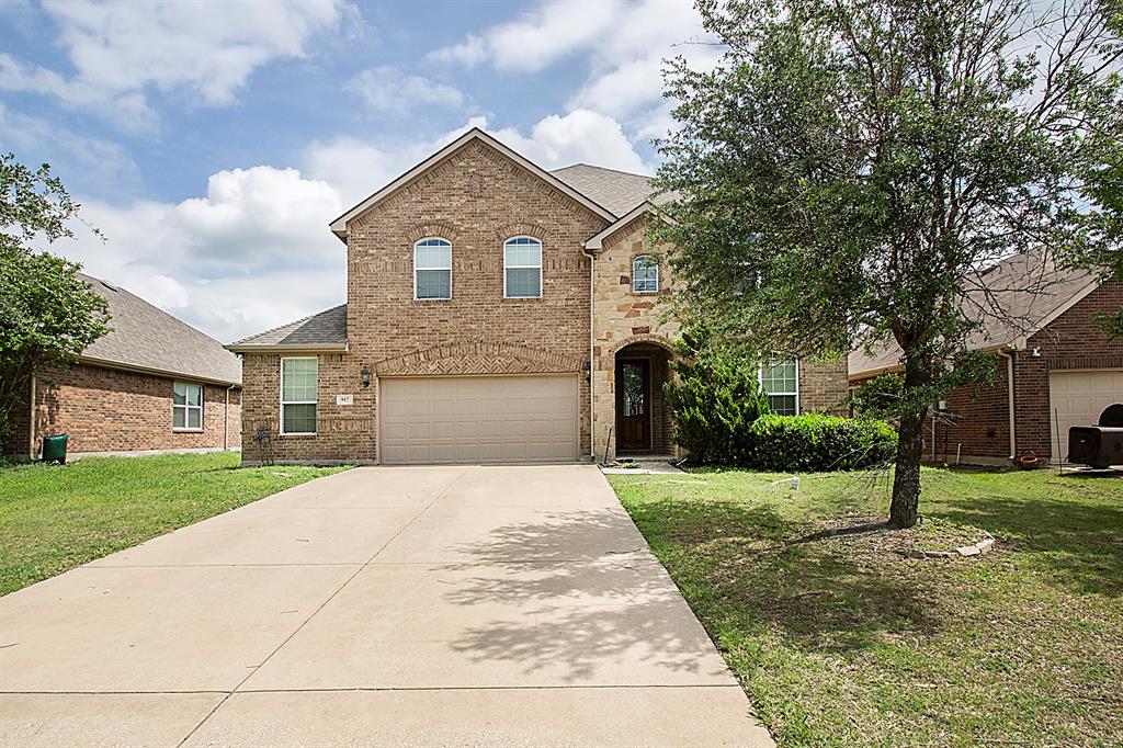 NEW FLOORING AND FULL HOUSE PAINT. Formal model home. Beautiful house with Great Open Floor Plan! 5 bedrooms. Extra large garage. Downstairs has Master Bedroom, upstairs has 3 bedrooms. Granite countertops, Stainless steel appliances, 42 inch raised panel Expresso cabinets with crown, tile, tumbled marble backsplash, wood floors, upgraded carpet, separate tub and shower, wrought iron balusters, and zoned AC. Pre-wired. Beautiful 2 and half car garage with cane lights. Covered back patio.