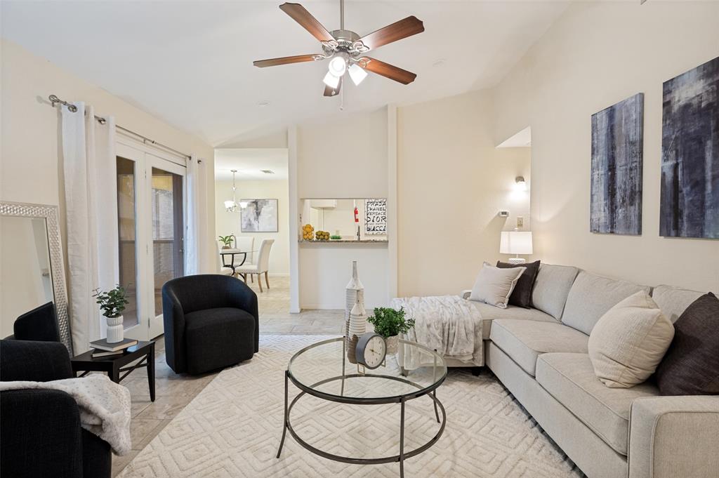 Soaring Ceilings greet you in this light and bright two bed two bath in this Fabulous Lock and Leave Community in North Arlington! Gated Community offers 3 Pools, Tennis, Pickleball Courts, Indoor Racquetball, Jacuzzi, Indoor Sauna and Fitness Room. Walk to La Mad for Breakfast! Porcelain Tile floors grace the floors and add to the ambiance. Large kitchen offers rich granite counters, recently painted cabinetry, updated stainless steel dishwasher, microwave and range, pantry and storage for the cook! Separate Dining area is perfect for entertaining. Living room offers ample room for large pieces and boast a vaulted ceiling, all popcorn removed, and canned lighting added with dimmer! Enjoy a cozy evening by the wood burning fireplace. Granite counters were added to both bathrooms as were the commodes and faucets. Both bathroom cabinets were also painted. Custom Elfa shelving was added to the closets. The primary suite boasts two closets and an oversized area for large pieces, office area or reading nook. The gorgeous ensuite bath a remodeled separate shower, lounging tub and private water closet. Enjoy coffee on your covered patio. A large storage closet is a bonus. Fridge and Washer Dryer to remain! The Cloisters offers so much! Onsite management, grounds maintenance, water, sewer, trash, pest control and full use of all facilities. Two gated entrances. Two reserved parking spaces in front of condo. Fantastic for commuters to Dallas or FW or those looking for an intown spot for the sports and entertainment enthusiasts. Take a tour of this inviting home today!