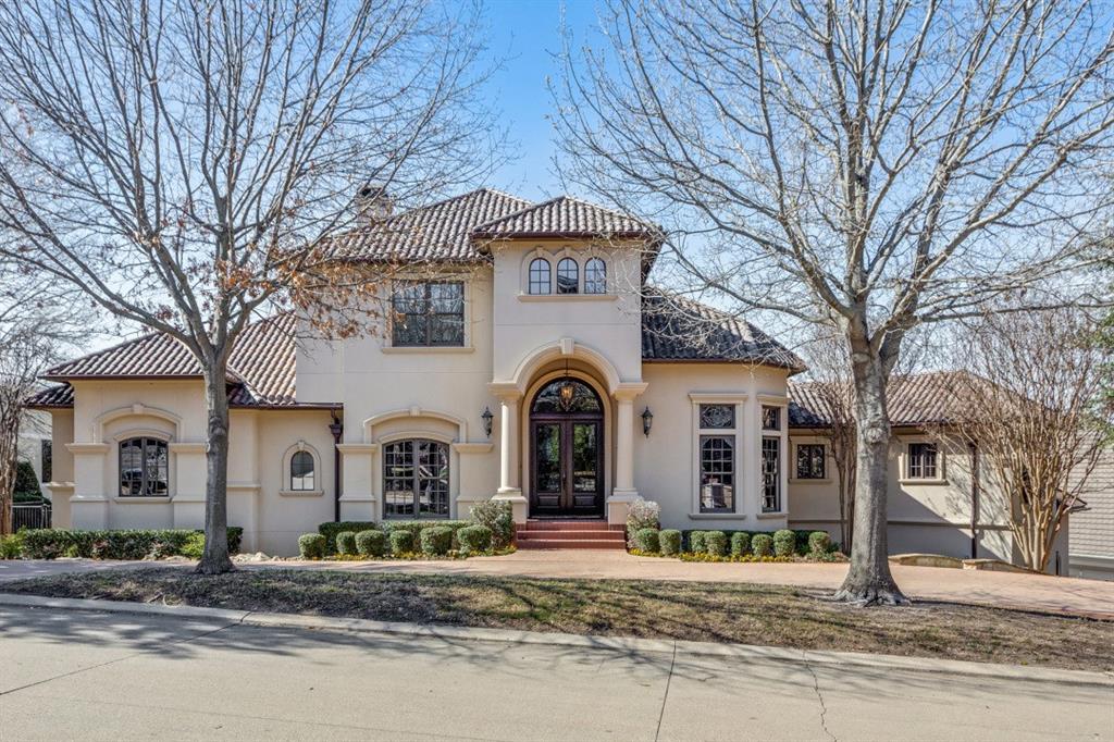 Welcome to the prestigious Mira Vista gated community! This stunning Mediterranean-style home, built by the Morrison Group, boasts incredible million-dollar views from its three-story elevation on the 16th T-box. With five bedrooms, each with private baths, plus a potential sixth bedroom or bonus room, there's plenty of space for everyone. Enjoy the elegant grand foyer with Travertine tile throughout most rooms. The home features two half baths, two living areas, five fireplaces, a gourmet kitchen with granite countertops, Viking appliances, and an oversized island. Outside, indulge in the beautiful pool and spa with a slide and diving board, along with an outdoor kitchen and grill. Relax by the fireplace on the large covered main level patio. Other highlights include an office-library, utility-craft room, and a climate-controlled four-car garage with a gated driveway.  Bordering a fully manicured one acre green space, this home offers privacy and luxury living at it's finest.