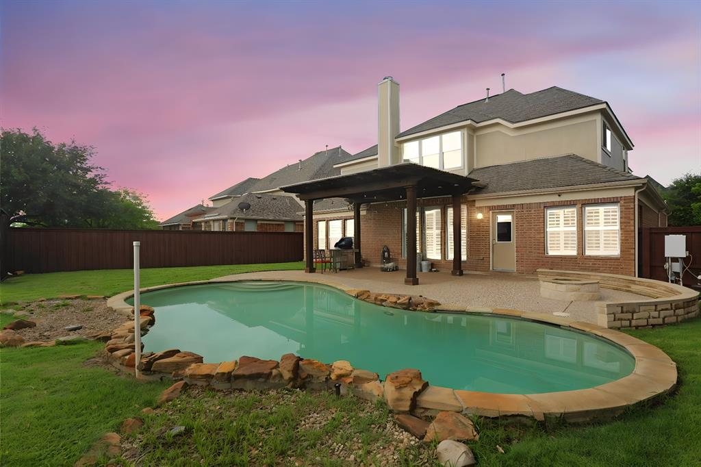 Welcome to a home that truly checks all the boxes, prime location, top-rated schools, and an incredible backyard retreat. Located in the highly sought-after Gentle Creek Estates community, this home is zoned to Prosper ISD, including Walnut Grove High School. Step inside to find soaring ceilings, plantation shutters, a private study with French doors, and a formal dining space that flows into the open-concept living area, all overlooking the beautifully designed backyard. The home offers 5 bedrooms and 3.5 baths, with the primary suite downstairs and a spacious upstairs layout featuring a large game room, 4 additional bedrooms, and 2 full baths. The backyard is designed for both relaxation and entertaining, complete with a sparkling pool and pergola. Residents of Gentle Creek enjoy access to a clubhouse, community pool, walking paths, and close proximity to the Gentle Creek Golf Club. Updates include epoxy garage floors, EV charging outlet, mini-split in the garage, HVAC Aug 2021, water heater July 2022, and pool salt cell May 2023.  This home offers not just comfort and style—but a lifestyle you’ll love.