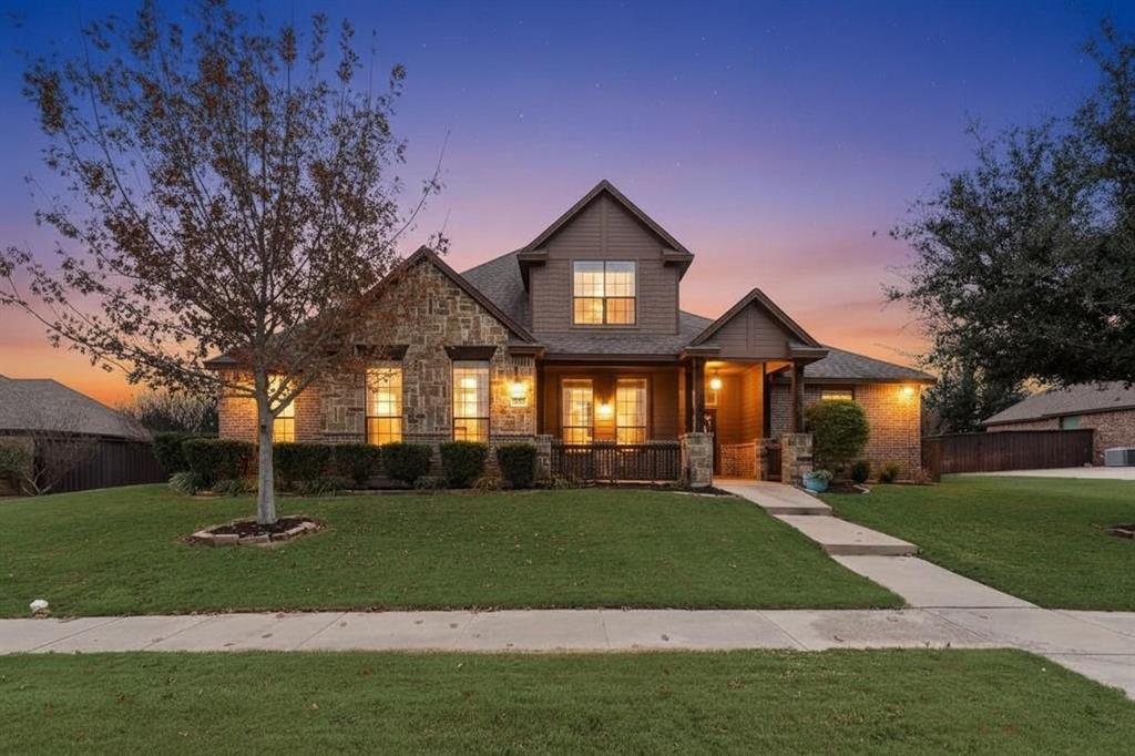 From the oversized backyard with room for a pool to the desirable first-floor primary suite and three-car garage, this 4-bedroom, 3-bath home offers exceptional space and versatility. Situated on a .35-acre lot, the home features an open-concept, light-filled floor plan with tile-wood flooring and a spacious living area centered around a stone fireplace with gas logs.

The kitchen offers granite countertops, a large island with breakfast bar seating, stainless steel appliances, electric cooktop, and a walk-in pantry. A private study near the entry provides a functional work-from-home space.

The first-floor primary suite includes dual vanities, soaking tub, separate shower, and an oversized walk-in closet with direct access to the laundry room. A secondary bedroom on the main level adds flexibility for guests or multigenerational living.

Upstairs features two additional bedrooms and a spacious game room, ideal for a second living area or media space.

The expansive backyard and covered patio provide ample space for outdoor entertaining, with room to add a pool. Mudroom and three-car garage offer additional storage and convenience.
Midlothian ISD! Only 21 miles South of Dallas!
