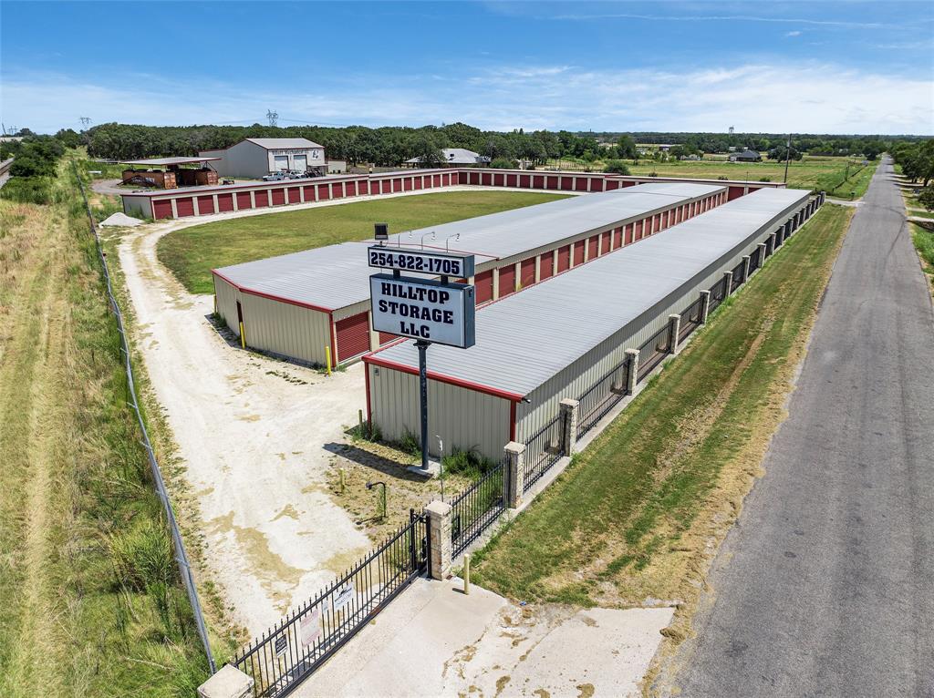 Introducing an incredible investment opportunity - Hilltop Road Storage Units! This well-established storage facility boasts 130 storage units, all of which are currently 100% leased out, showcasing its strong occupancy and consistent income stream. Located conveniently close to I35, this property enjoys excellent visibility and accessibility, attracting a steady flow of customers. With the potential to expand, the property provides room to build an additional 100 storage units, allowing for further growth and increased revenue potential. The high demand for storage in the area makes this expansion an attractive prospect for investors seeking to maximize their returns. Across the road, you will find 3 acres with RV covered and uncovered storage.