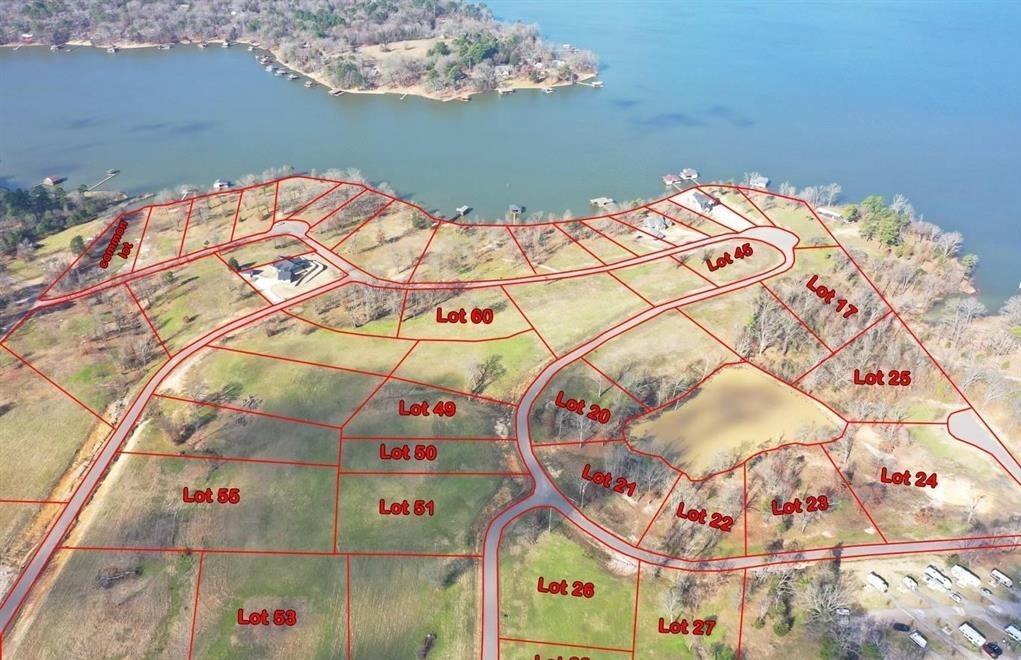 Discover the perfect place to build your lake getaway in SouthShores, a beautiful new gated subdivision on the shores of Lake Bob Sandlin. Just a couple of hours from the DFW metroplex, this up-and-coming community offers the peace of lake living with the convenience of nearby access.
Enjoy exclusive access to a community waterfront lot featuring a fishing dock, perfect for relaxing weekends and making memories with friends and family. Whether you're dreaming of a weekend retreat or a full-time lake home, SouthShores provides the ideal setting for your custom build. Secure your lot now and start planning your life at the lake! This lot is an interior lot!