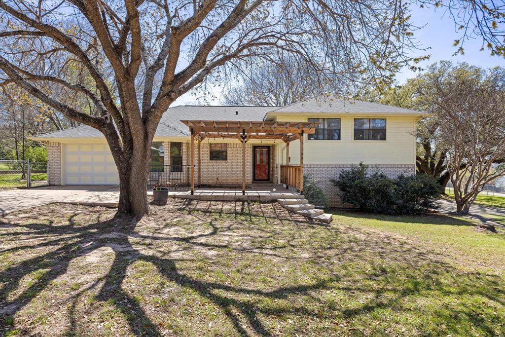 Half an acre, minutes from the square, FOUR car garage, flex space galore.  

Welcome to 1701 Hitching Post Road, a quaint, revitalizing neighborhood where shade trees, a slower pace of life and great neighbors offer what we're all hoping for - back yard bar-b-q's and quiet evenings, neighborhood potlucks.    

With 2 beds, 2 baths on the main level, and a HUGE room on the upper level that could be anything from a bunk room to a yoga studio to anything you can imagine, this property is a must see.  The versatilty is fantastic.

There are 2 garage spaces on the lower level and 1 on the top.  Bring your hobbies!

Step outside and enjoy the expansive yard shaded by large, mature trees, creating a relaxing outdoor setting with plenty of room to garden, play, or entertain.  Enjoy the beaufiful pergola over the expansive front patio, the perfect place for nature watching.

Residents of the neighborhood enjoy access to excellent community amenities, including:  community pool, boat ramp with easy lake access and a fishing dock for a relaxing time on the water.
