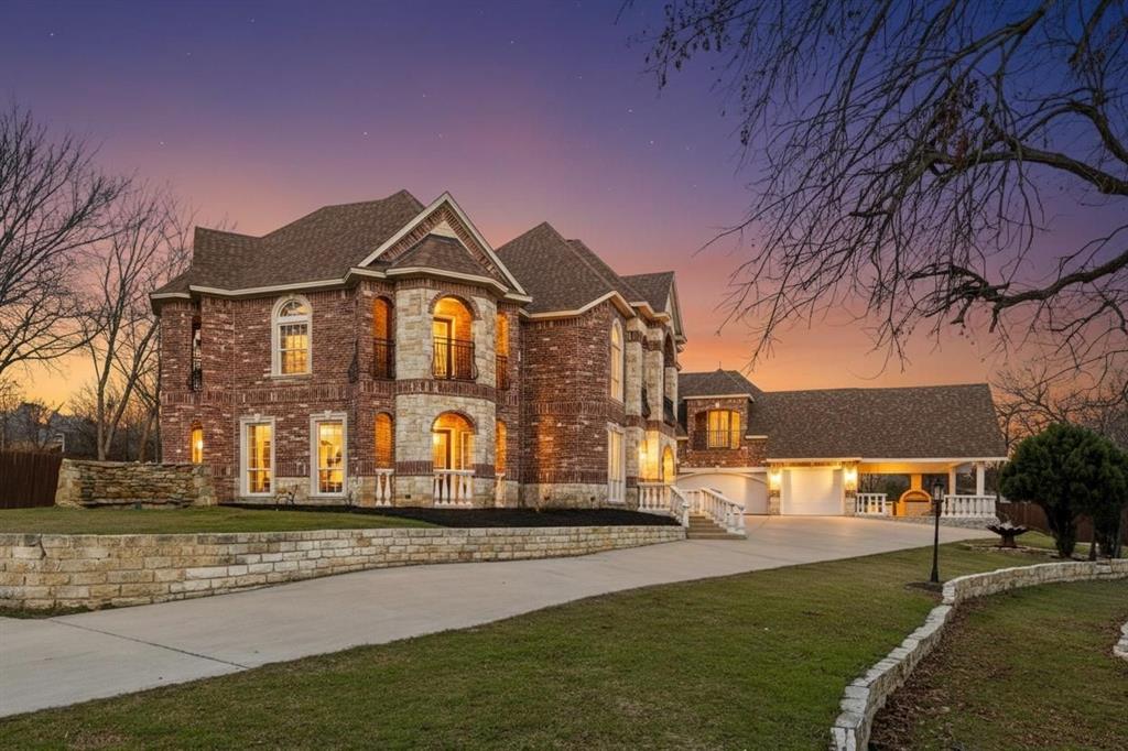 **4 ACRES!**DIRECTLY ACROSS THE STREET FROM 44 ACRE BEAR CREEK PARK!**NO HOA!** Exquisite gated estate on 4 acres in the heart of Keller. This masterfully updated residence balances grand-scale entertaining with intimate family living. Boasting 6 bedrooms, 8 baths, and 6 living areas—including a tiered home theater—the design shines with soaring ceilings, Roman arches, and meticulous custom built-ins. A chef’s dream, the gourmet kitchen features professional appliances and an expansive gathering island. Retreat to a primary suite that offers beautiful views and a spa-inspired bath. You can create your own outside lifestyle and adventures on this 4 acre lot that is heavily treed, a creek running along the property, extensive grass areas to create your own private oasis, a large covered patio perfect for entertaining and relaxing. You will love the oversized 3-car garage. Award-winning Keller ISD, great proximity to shopping, dining, and entertainment. A rare blend of privacy, luxury, and convenience.  Enjoy the lifestyle offered by living directly next to Bear Creek Park - featuring the following amenities: pickleball courts, 2 playgrounds, multiple pavilions, hiking and biking trail, 4 sand volleyball courts, basketball court, restroom facility, picnic tables and grills,  in-line hockey rink, 4 multi-use soccer practice areas, 5 baseball practice areas, a fire pit, drinking fountains, 2 gazebos - all within a two minute walk from this beautiful home!