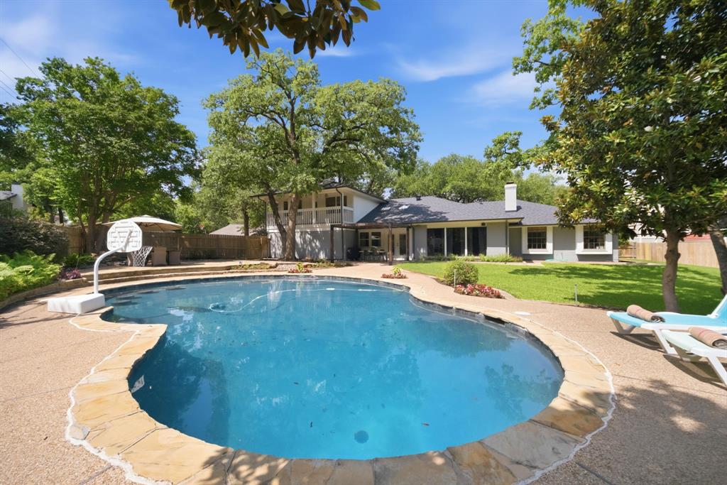 A half-acre lot like this is hard to find, especially with this level of privacy, outdoor living, and usable backyard space. Tucked away on one of the most private cul-de-sacs, this nearly fully renovated 4-bedroom, 3-bath home offers the kind of setting buyers are always hoping to find but rarely do.
The backyard is the standout feature, with a sparkling pool, expansive grassy areas, mature privacy, and multiple spaces to eat, grill, relax, and entertain. It is the kind of yard that works just as well for quiet evenings at home as it does for hosting family and friends.
Inside, the home has been thoughtfully updated with comfortable living spaces, a functional layout, and four bedrooms that offer flexibility for family, guests, or a home office. Another rare benefit is the ability for the buyer to choose between HEB ISD or Grapevine-Colleyville ISD, offering unusual flexibility in school options.
Located on an oversized lot in a quiet cul-de-sac, this home brings together privacy, updates, school choice, and exceptional outdoor living in one rare opportunity.