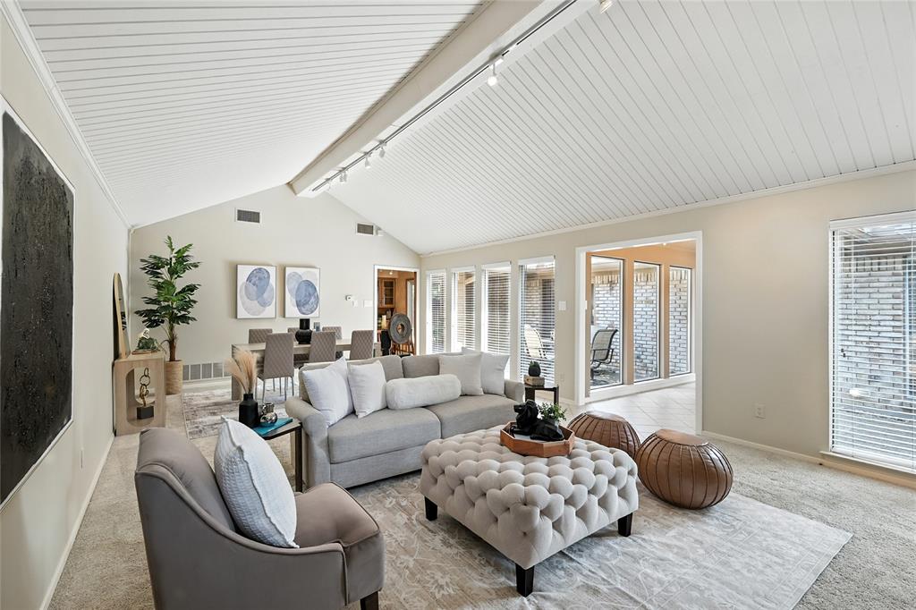Discover this energy-efficient, soft contemporary home nestled in a well-established and sought-after North Dallas neighborhood offering both comfort and convenience with no HOA, zoning to top-rated Brentfield Elementary in RISD and FULLY PAID-OFF solar panels with low electric bills averaging $41 per month. Step inside to an inviting space filled with abundant natural light from expansive windows. The main living and dining areas feature vaulted ceilings, built-in cabinetry, and a cozy gas-log fireplace—perfect for relaxing evenings. The eat-in kitchen is equipped with granite counter tops and stainless steel appliances, all overlooking a charming private courtyard -- ideal for morning coffee or quiet outdoor dining. A spacious second living area boasts high ceilings, built-in shelving, and a desk, making it a perfect home office or flex space. The primary suite is a true retreat, featuring French doors that open to the courtyard. The primary bath includes dual sinks, a garden tub, a separate shower, and two walk-in closets. Secondary bedrooms are thoughtfully separated from the primary suite and offer ceiling fans and walk-in closets, providing comfort and privacy for family or guests. Enjoy outdoor living in the large backyard, perfect for entertaining. This home is designed for efficiency and savings. In addition to the solar panels, the home features extra attic insulation and Mylar window inserts. Additional highlights include a foundation repair with a transferable warranty. Ideally located with easy access to George Bush Turnpike and Dallas North Tollway, BaylorScott & White Hospital, and just minutes from Addison and the Galleria for premier shopping, dining, entertainment, and most importantly, the Wagging Tail Dog Park, for the 4-legged children in your life. Refrigerator and stackable washer and dryer to remain.