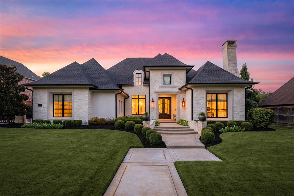 RARE FIND SPECTACULAR SINGLE STORY IN COLLEYVILLE WITH ALL BELLS AND WHISTLES!! Fabulous open concept, 3-way split floorplan. This custom built home exudes perfection, starting with the French smear stone exterior and the grand M2 Metal front door. Inside, elegance meets innovation with a climate-controlled wine room. Entertain in style at the home bar with an ice maker and German glass cabinetry.  The kitchen is a culinary masterpiece with top-tier Thermador appliances, complemented by stunning marble counters. Architectural detailing shines through custom-designed ceilings. Luxury extends outdoors with a tranquil Watercrest built pool, retractable recessed patio screen and a DCS gas ceiling heater. Seamlessly blend indoor and outdoor living with Pella windows and sliding doors leading to amazing outdoor living, dining and kitchen. Smart home features provide control over security, garage, pool, and sprinklers. Bevolo gas lanterns add opulence. A MUST SEE!! Too many extras to list!