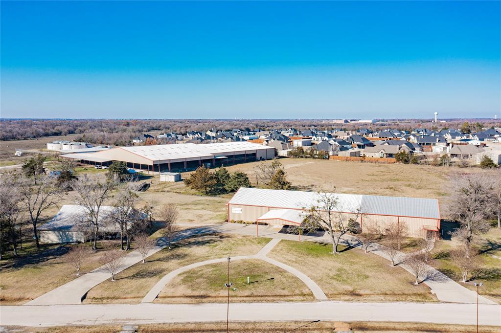 125.08 beautiful acres only 2 miles from I-30 with 4 ponds and a creek ready to let your imagination come alive! The possibilities are endless with this unique property. This property already offers an oversized covered arena, 80x100 covered stall barn, concession stand, bleachers, 15 RV hookups, 6 log cabins, two level 10,000sqft metal building currently being used for church services. 4,000sqft office building with kitchen, dining, classrooms and game room and a 5,000sqft storage unit. There are many uses and options for this wonderful property. You can build single-family homes, commercial events, wedding venue, sports complex, rodeos, etc. Do not miss out on this one!!