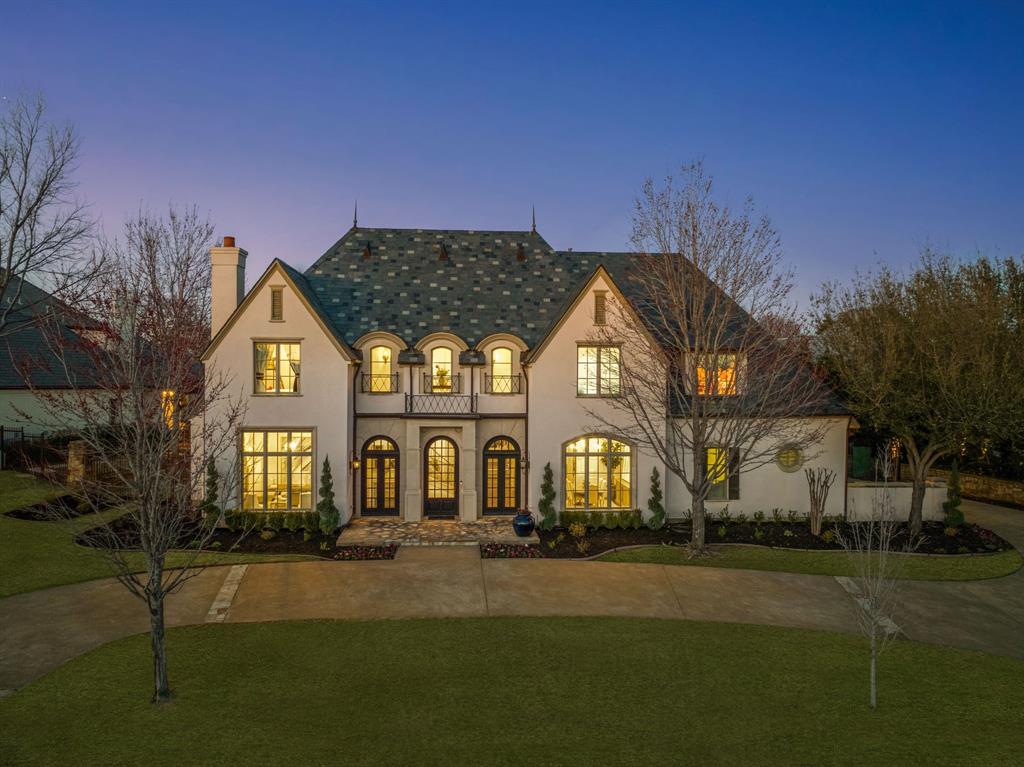 Elegant French-inspired home on a coveted street in the prestigious guarded and gated community of Vaquero. This exquisite residence boasts a timeless stucco exterior with a slate roof, complemented by rich wood, travertine, marble, and slate flooring. Luxurious finishes include granite, marble, and travertine countertops, along with striking wood ceiling beams. The gourmet kitchen features top-tier Sub-Zero, Viking, and Asko appliances. A sophisticated office-study provides a refined workspace, while the upstairs media-exercise room offers versatility and could be converted into a fifth bedroom. The outdoor oasis showcases a stunning pool with beach entry, a spa, and a serene water feature. Additional highlights include a golf cart garage and eligibility for the esteemed Westlake Academy.