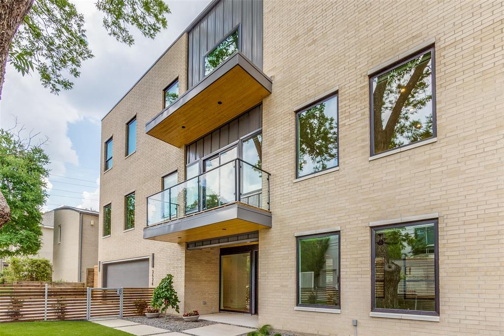 Discover contemporary elegance just steps from Katy Trail in the highly sought-after Northern Heights neighborhood. This stunning 3-bedroom, 3.5-bath home is filled with natural light across all levels and offers convenient access via both stairs and a private elevator.  A large private fenced front yard provides a rare outdoor retreat. The first floor welcomes you with an inviting foyer, leading to a private guest suite with an ensuite bath—perfect for visitors or a home office, as well as a functional mudroom located just off the garage.  On the second level, enjoy a bright and open-concept living space featuring a spacious balcony and a cozy gas fireplace. The living area flows seamlessly into the dining space with a stylish wet bar and continues into the chef’s kitchen, complete with stainless steel appliances, quartz countertops, sleek cabinetry, and a generous walk-in pantry. The top floor hosts a luxurious primary suite with a spa-inspired bathroom, including dual vanities, a soaking tub, separate shower, and an expansive walk-in closet. An additional bedroom with its own ensuite bath and walk-in closet, along with a well-appointed laundry room with sink, completes this level. Ideally located near the vibrant Knox-Travis corridor, this home offers easy access to premier dining, shopping, and entertainment, along with convenient routes to US-75 and the Dallas North Tollway for effortless commuting.