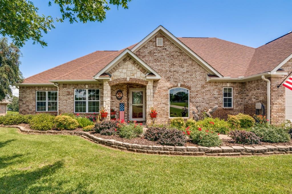 Lakefront living at its finest in sought after Pinson Springs! This beautifully updated home offers direct lake access with a private dock, making it perfect for boating, fishing, and enjoying peaceful waterfront sunsets. Situated on a lush oversized lot with manicured St. Augustine grass in the front and side yards, the property also features a full sprinkler system on all deeded area for easy maintenance.

Step outside to a spacious back deck overlooking the water ; ideal for entertaining or relaxing with family and friends. Inside, the home has been completely updated with a modern yet warm design. Large picture windows fill the space with natural light and showcase stunning lake views. Engineered hardwood floors run throughout the main living areas, while the guest bedrooms offer comfortable carpeting.

This move-in ready waterfront retreat combines luxury, comfort, and outdoor living in one exceptional property.
The AC has an 18 seer variable speed inverter heat pump with 20 kw backup heat. Its the most energy efficient system available which keeps electric bills very low! Two refrigerators, washer and dryer will convey with the property.