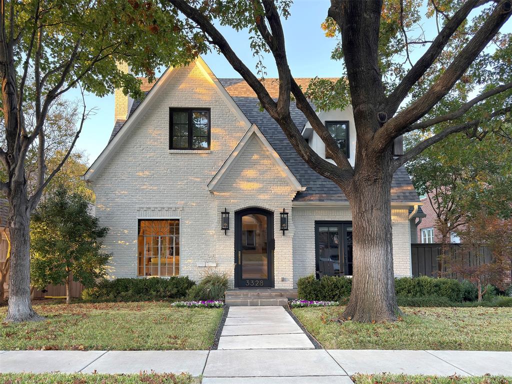 This five bedroom Tudor in University Park was exquisitely reimagined and modernized in 2019, offering an impressive blend of historic charm and elegance in a fun Park Cities location. Step inside this sophisticated property to find an open floor plan with hardwood floors, clean lines, decorative moldings, and expansive casement windows that fill the home with natural light. The first floor, featuring 10ft ceilings, includes a cozy study off the entry and a living room adorned with an original stained glass window and fireplace that seamlessly flows to the formal dining area. The expanded and redesigned kitchen boasts an oversized quartzite island with seating for six, a coffee bar with built-in Miele coffee machine, and walk-in pantry. The family room, with 11ft ceilings, fireplace, bar and a wall of French doors, gracefully opens to a landscaped back yard complete with turf and a covered patio, ideal for entertaining. The luxurious first floor primary suite has access to the backyard and offers a serene escape with a beautiful marble bath that includes soaking tub, double vanities, and a spacious walk-in closet. Upstairs, discover four additional bedrooms, each with en-suite baths, along with a spacious game room and a large unfinished room above the garage that could be an additional bedroom if needed. With a two-car attached garage and designer finishes throughout, this impeccably maintained home in HPISD is move-in ready and lives like new construction.Walking distance to Snider Plaza, as well as University Park Elementary, the UP Pool, and SMU, this property is a must see!