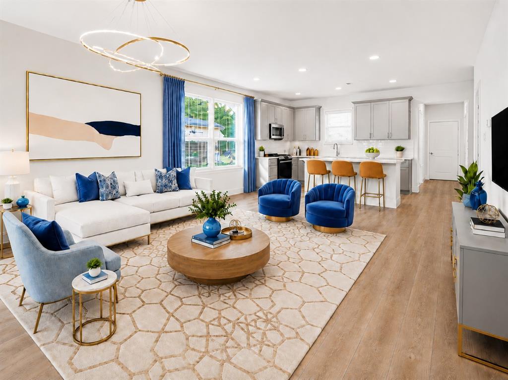 NOW UNDER $440K + PAID 2-1 Buydown + NO HOA!  Like-new, low-maintenance luxury corner townhome with no HOA, ideally located just 3 miles from Fort Worth’s Cultural District. Built in 2022, this move-in ready home offers an attached two-car garage, custom front yard fence with gate, and a cozy side patio with TV—perfect for grilling, relaxing, and enjoying the sunset.

Inside, the first floor features a light, bright, open-concept layout with seamless flow between the living, dining, and kitchen areas. The upgraded kitchen includes high-end cabinetry, abundant storage, a walk-in pantry, sleek stainless-steel appliances, and stylish designer finishes throughout.

Upstairs, you’ll find three generously sized bedrooms, a spacious loft-den with a cozy alcove, and a smart split-bedroom layout. The impressive primary suite is the standout feature, offering a vaulted ceiling, gorgeous windows, a beautiful ensuite bath, glass shower, elegant double vanity, and an oversized walk-in closet with exceptional hanging and storage space. It feels like a true dressing room and brings a luxury hotel-suite feel to everyday living.

The second and third bedrooms each include walk-in closets and share a double vanity bath, making them ideal for guests, office space, fitness, or work-from-home needs. The upstairs laundry room is conveniently located near the bedrooms and loft for easy daily living.

With designer finish-outs, an attached two-car garage, no HOA, and low-maintenance lock-and-leave convenience, this townhome offers rare flexibility at an unbeatable price. Whether you’re heading to nearby dining, enjoying the Trinity River Trails, or looking for a move-in ready home close to Fort Worth’s best amenities, this River District townhome delivers location, comfort, and elevated style in one beautiful package.