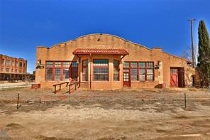 The Burlington depot at the corner of Locust & S 2nd is the gateway to this 5.42 acre parcel of largely undeveloped land in Abilene's SoDA district. Zoned LI, in an opportunity zone, & used for rail, this tract is the largest, contiguous acreage in the South Abilene Planning District. Two buildings are on this property: the 3040 sf Burlington depot & the 3200 sf rail maintenance barn. With the arrival of new bars & restaurants in this area, this parcel would be suitable for redevelopment with mixed-use housing and retail to compliment extant businesses. A 1.08 acre property in the center of this parcel with a 15,000 sf warehouse at 133 Cherry is also listed, bringing this tract to 6.5 acres in downtown Abilene.