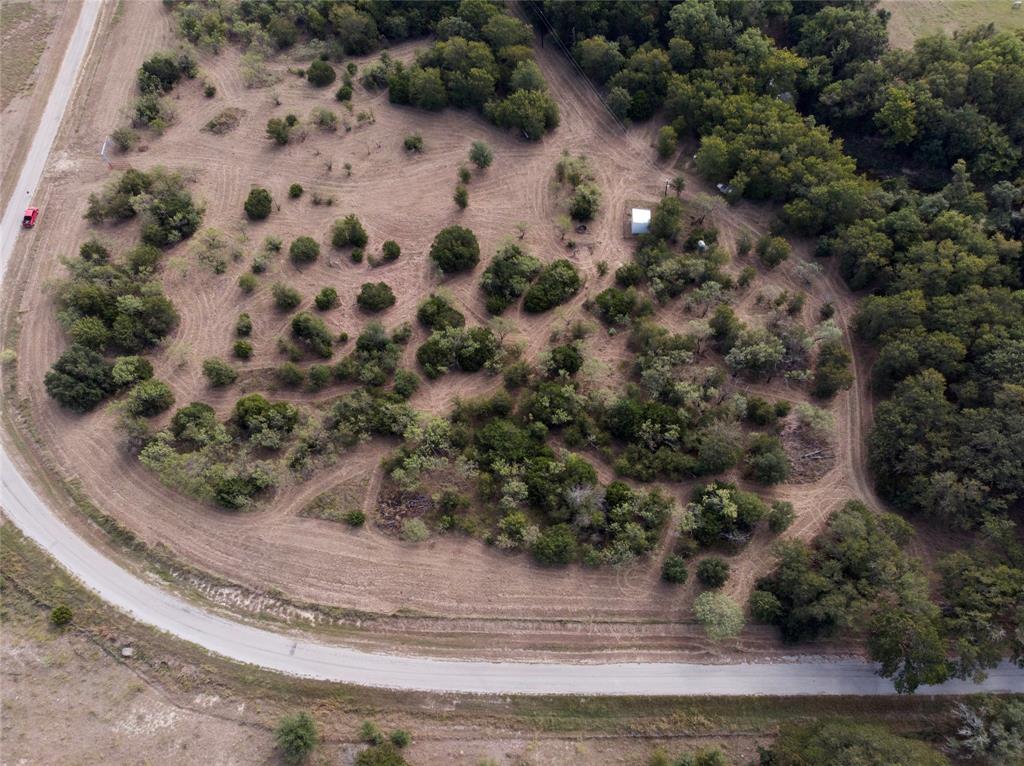 Property Highlights
• Total Acreage: 18.9 acres located in the desirable Steed Addition
• Lot Options: Seller is wanting to sell as a whole. Will consider selling the four platted lots individually. Each lot is approximately 4.5+ acres each.
• Topography & Setting: Heavily treed with mature hardwoods, rolling terrain, and abundant natural beauty
• Wildlife: Frequent sightings of deer, turkey, and other native wildlife
• Access: Two established entry gates providing convenient and secure access
• Utilities:
o       Electricity is already run to the property
o Septic system required for residential use, if lots are sold individually or as a whole

• WATER:
o      Trinity well located on Lot 1, housed in an oversized commercial-grade insulated well house
o Well depth approx. 280–300 ft, pumping approx. 15 GPM
o Individual wells needed for remaining lots unless purchased together
 
• Floodplain Information:
o A portion of the property lies within the floodplain as noted on the plat
o Ample buildable area outside the floodplain on all lots
 
• Restrictions: Minimal deed restrictions; no mobile homes allowed
• Ideal Uses: Custom homes, private retreat, small-scale development, or long-term investment
• Environment: Private, quiet setting with natural character and multiple potential homesite locations