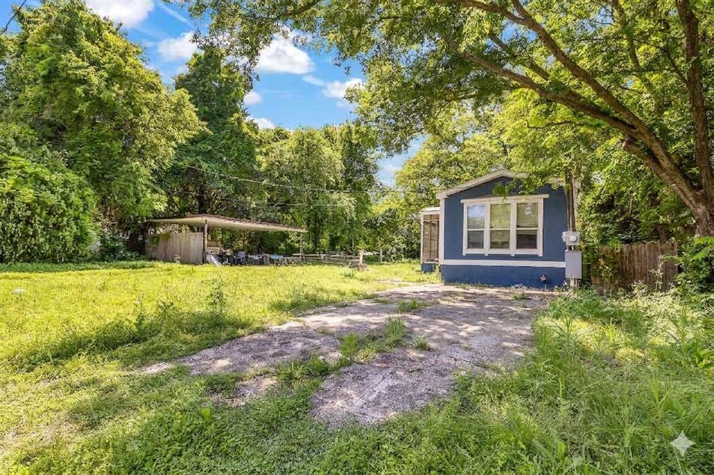 Nestled on a spacious lot of nearly half an acre shaded by majestic mature pecan trees, this three bedroom and two bathroom home offers a peaceful retreat in the heart of Azle. The property features a functional three bedroom layout spanning over one thousand square feet and includes a convenient carport for covered parking. Located within the desirable Silver Creek Elementary school zone, the home provides quick access to local shopping and city parks while maintaining a quiet residential feel. With updated climate control systems and a private community water&sewer, yet still has a well also , this property represents a fantastic opportunity for anyone looking to customize a home on a large lot in a prime location.
