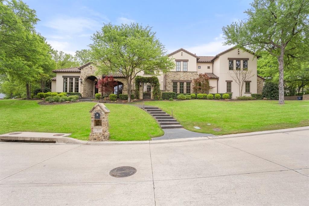 Welcome to this exquisite home located in the guarded, gated community of Mira Vista. This home features 5 bedrooms, 5 full and 3 half bathrooms, perfectly designed for sophisticated living and entertaining. Nestled on a quiet cul-de-sac, this home offers an unparalleled lifestyle with it's stunning architectural details and resort-style amenities. Step inside to find an entertainer's dream! The show-stopping climate-controlled walk-in wine room has been beautifully constructed to serve guests in dining room as well as the stunning formal living room. The kitchen features two massive quartz islands, two sinks, top of the line professional grade appliances, and a Miele coffee system. The downstairs features a private office, two spacious dining areas and dual living spaces, a laundry room with chute from upstairs, and a guest room with an ensuite bath. The luxurious primary suite includes a spa-like bath and an expansive closet with washer dryer hookups. Upstairs, find three additional bedrooms with en-suite baths, and an incredible game room with a bar, projector screen, private bath, plus a balcony overlooking the lush backyard oasis. The backyard is the definition of luxury with a pool and spa featuring waterfall and fire pit accents, a full outdoor kitchen with built in gas green, two green eggs, pool bath, and outdoor fireplace. It also features a separate fire pit, a large shaded turf yard and a putting and chipping green. Additional features included a 3-car garage with it's own AC unit and custom built cabinetry, a full home generator, and gorgeous gas lanterns that illuminate the home. This is an entertainer's paradise you don't want to miss!!!