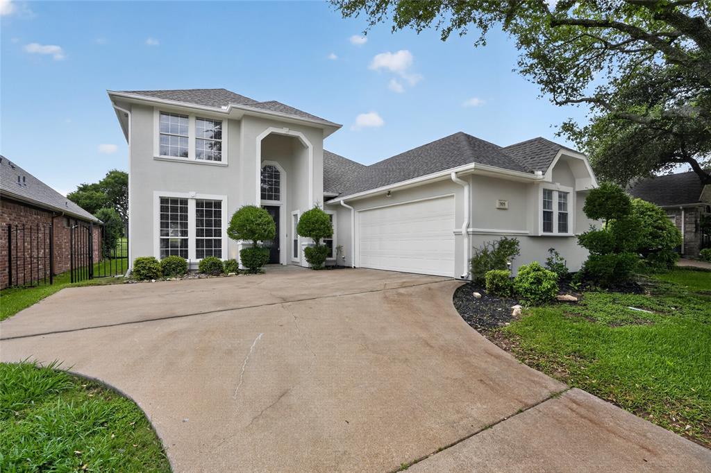 Beautifully Remodeled Golf Course Garden Home 3 bedroom 2 and half bath house. Enjoy stunning golf course views from this beautifully updated garden home located on the first hole and within walking distance of the country club. This move-in-ready home has been completely remodeled and features high ceilings, designer lighting, and an inviting entryway. The spacious living area is filled with natural light from large windows that showcase picturesque views of the course. A color-changing electric fireplace creates a warm and elegant focal point.The updated kitchen offers quartz countertops, stainless steel appliances, an electric cooktop, built-in microwave, stainless steel sink, and abundant storage, including convenient pull-out cabinet drawers. New laminate flooring flows throughout the home, providing a fresh and modern feel.The primary suite features golf course views, a luxurious spa like bathroom with double vanities, a walk-in shower, and a large walk-in closet. A private atrium offers the perfect space for relaxing.Additional highlights include a beautiful study with custom built-in bookcases and an upstairs balcony overlooking the golf course.This exceptional home combines modern updates, low-maintenance living, and an unbeatable golf course location.