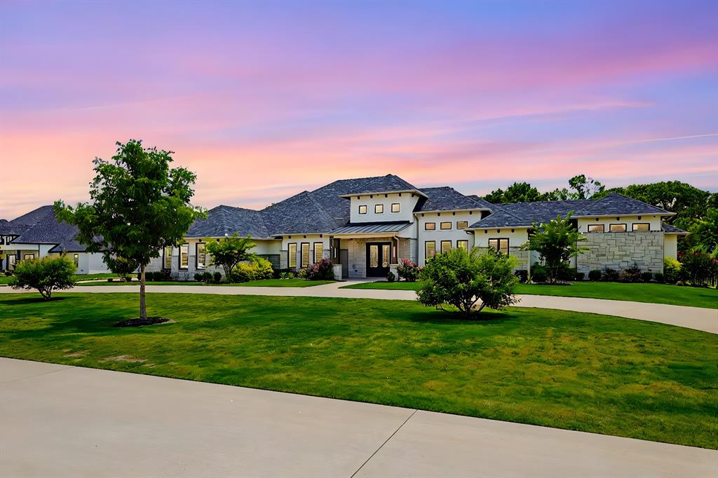 Luxury meets serenity. ONLY 1.46% TAX RATE!!!!!! Located in the highly sought Hidden Creeks Pointe, this custom Dave R Williams home sits on over 1.5 acres,backing to miles of woodlands.Heated pool+spa.Private Gated Community w only 17 homes.Open floorplan w vaulted ceilings,wood beams.Main living room wall opens entirely to the outdoor living areas.Main patio w remote screens to enclose.Main kitchen features high end finishes,flush mount cabinetry+ commercial appliances.Hidden pocket door opens to additional full prep kitchen-complete w ss appliances and upgraded ventilation Solid hardwood flooring and plantation shutters throughout.Primary suite separated from secondary bedrooms w private outdoor access,custom closets w built ins and safe storage.Executive office w coffered ceilings,outside access and private patio.Oversized secondary bedrooms all w en suite baths,custom auto lit walk in closets.Home generator,upgraded propane tank .Air+water purification system.4 car garage w AC.