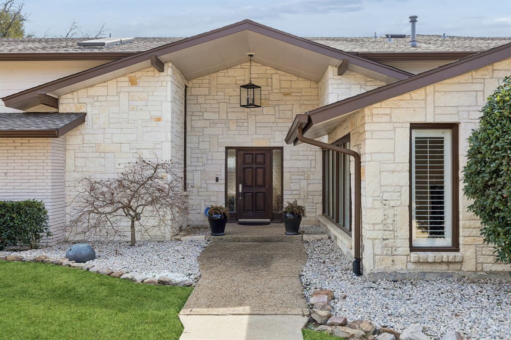 Set on almost a half-acre lot in the prestigious Northwood Hills neighborhood, this stunning home offers the perfect blend of space, comfort, and lifestyle, featuring 6 bedrooms, 4 full bathrooms, and a half bathroom.

Designed for both everyday living and effortless entertaining, the thoughtful floor plan spans two well-appointed levels. Sunlight pours into the inviting living room, where custom built-ins and a warm fireplace create a welcoming focal point. Just beyond, the kitchen blends function and charm with granite countertops, its own fireplace, and seamless connection to the dining room, ideal for hosting gatherings both large and small.

The main level includes a generous primary suite filled with natural light, complete with a spacious ensuite bath featuring a soaking tub and walk-in closet. Downstairs, two additional bedrooms and a full bath provide flexibility for family or guests.

Upstairs, three additional bedrooms offer comfortable accommodations, including two connected by a Jack-and-Jill bath, plus an additional full bathroom. A versatile second living area, dedicated office, and private gym create flexible spaces suited for today’s evolving lifestyle. Step onto the balcony for peaceful views overlooking the backyard.

Outdoors, the backyard is designed for activity and enjoyment, highlighted by a graciously sized sport court and ample space for recreation and gatherings.

Blending generous square footage, functional design, and a prime location in Northwood Hills, this home is zoned to the highly regarded RISD and offers exceptional livability in one of North Dallas’ most established neighborhoods.