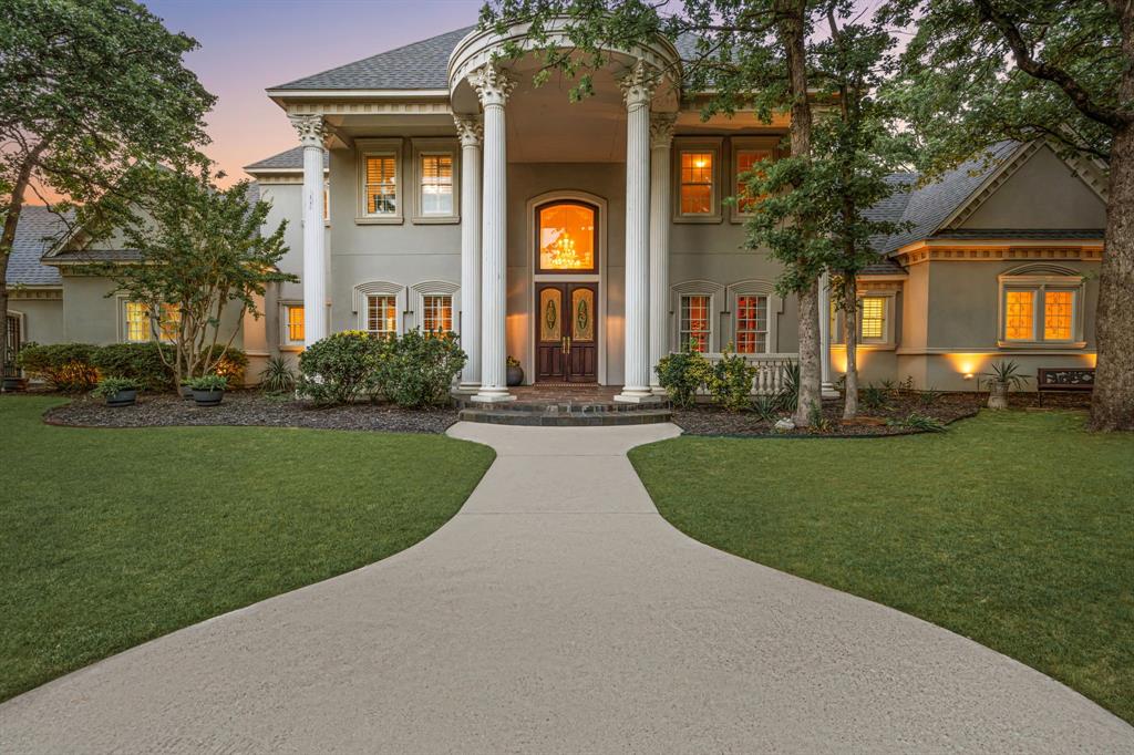 Set within one of Westlake’s most private and prestigious enclaves, this custom home offers a rare blend of seclusion, comfort, and exceptional potential. Tucked away on a quiet cul-de-sac and surrounded by mature trees on a full acre, the property provides a peaceful sense of privacy from the moment you arrive, with ample room to create a resort-style pool and outdoor retreat. Thoughtfully designed for everyday living, the majority of the home’s living spaces are conveniently located on the first floor.The expansive primary  suite lives like its own private wing and features a hidden room, cedar closet, nursery or fitness space, sitting area, dual vanities, dual water closets, and a steam shower. A separate guest suite with its own sitting room and kitchenette offers ideal accommodations for long-term guests or multigenerational living. Additional first-floor highlights include a handsome library and dedicated media room, providing flexible spaces for work, relaxation, and entertaining. Every secondary bedroom features an ensuite bath, offering comfort and privacy throughout. Residents enjoy access to the highly acclaimed International Baccalaureate program at Westlake Academy, along with open enrollment eligibility to both Carroll ISD and Keller ISD three of the area’s most sought-after educational options. Recent updates include a new roof installed in 2025. This home is a rare opportunity to customize and elevate a remarkable estate in one of North Texas’ most coveted zip codes.