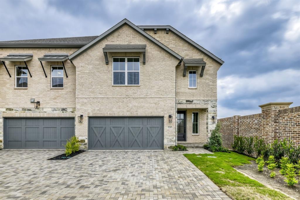 This desirable West-facing, 2-story design features a popular light brick color and gray stone elevation. Upon entering the large foyer there's a conveniently located powder bath just before reaching the wide-open main living space. The spacious family room offers a wall of widows for loads of natural light and opens to the dining area and the adjacent kitchen, which creates the perfect space for entertaining. The chef's kitchen is complete with a classic furniture-style island, stunning quartzite countertops, beautiful 3x10 tile splash, a bowed apron-front single bowl stainless sink, plenty of cabinets, and a large walk-in corner pantry. Upstairs is the main bedroom suite, plus 2 additional bedrooms, another full bath and a large game room for hosting family and friends. The utility room is also located on the 2nd floor for added convenience. Amenities include a gorgeous color scheme with beautiful light-colored prefinished wood floors downstairs, dark stained oak wood tread staircase with white painted risers, matte black finish lighting package and plumbing package, black metal stair balusters, frameless main shower, upgraded carpet and pad and so much more. Finishing out this lovely home is a covered outdoor living space and a 2-car garage with an additional garage niche area, which would be perfect for a work bench. Don't miss this opportunity!