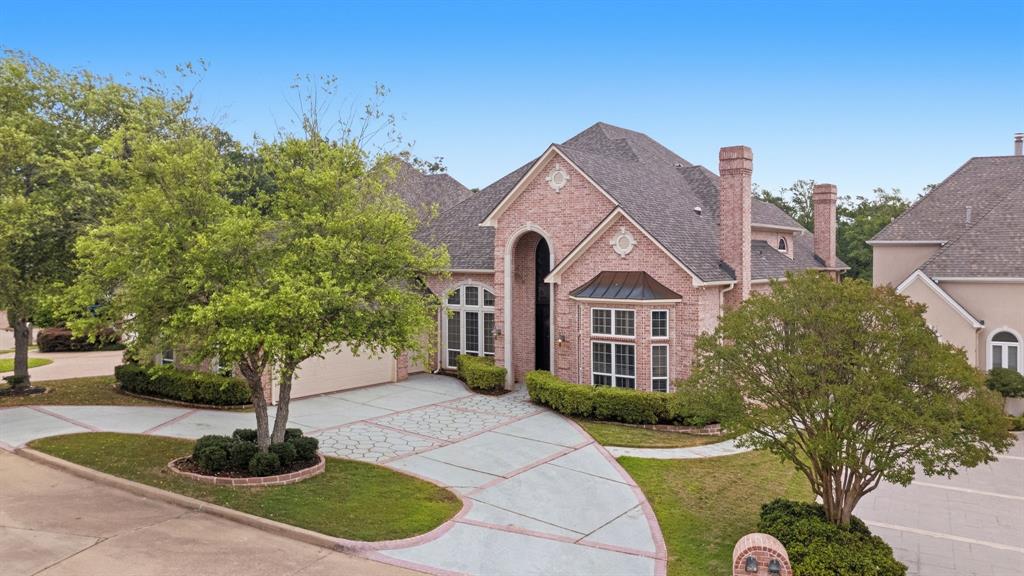 This extraordinary estate is located in the gated community of Winsford within the prestigious Hollytree community. Perfectly positioned on both the golf course and community lake, the property offers stunning views from your private pool and hot tub, creating a true resort styled setting. An impressive two story custom wrought iron entry welcomes you into an exceptional family room featuring soaring ceilings, artis painted details, and dramatic floor to ceiling windows designed to showcase the breathtaking lake and golf course views. Entertaining is effortless with a spacious refreshment center for guests, and this is only the beginning. The gourmet kitchen is beautifully appointed with a DACOR six burner gas cooktop, Kitchen Aid built-in refrigerator, double wall ovens added in August 2025, and warming drawer. The formal dining room is equally impressive, highlighted by a barrel ceiling with custom artist painting and a crystal chandelier. The luxurious primary suite offers a private sitting area and peaceful lake views. The expansive primary bath features a jetted tub, oversized shower for two, and separate his and her bath areas complete with large walk-in closets. Plantation shutters are featured throughout the home. Additional amenities include a separate study with fireplace and coffered ceilings, and an upstairs exercise room with private bath, and a three car garage that includes a dedicated golf cart garage. This remarkable property offers exceptional craftsmanship, luxury, and breathtaking surroundings at every turn. Schedule your private tour today-you do not want to miss this one. Be sure to see the detailed property booklet available in the documents section.