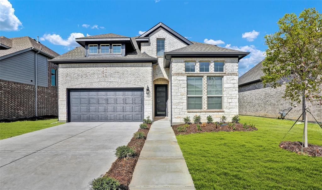 Amazing home in the master-planned Creekshaw community.  This dream home includes upgrades such as striking gourmet kitchen with large island, quartz counters, built-in stainless-steel gas appliances, and upscale pendant lighting. The private downstairs office off foyer is ideal for working from home.  This is the perfect entertaining home with open kitchen, dining, and great room. Owner's spa bath showcases dual sinks, a spacious shower, separate garden tub, and expansive walk-in closet. The impressive staircase features wrought iron spindles leading upstairs to an oversized game room.   Home has 2 oversized secondary bedrooms with walk in closets. $44,900 in upgrades!