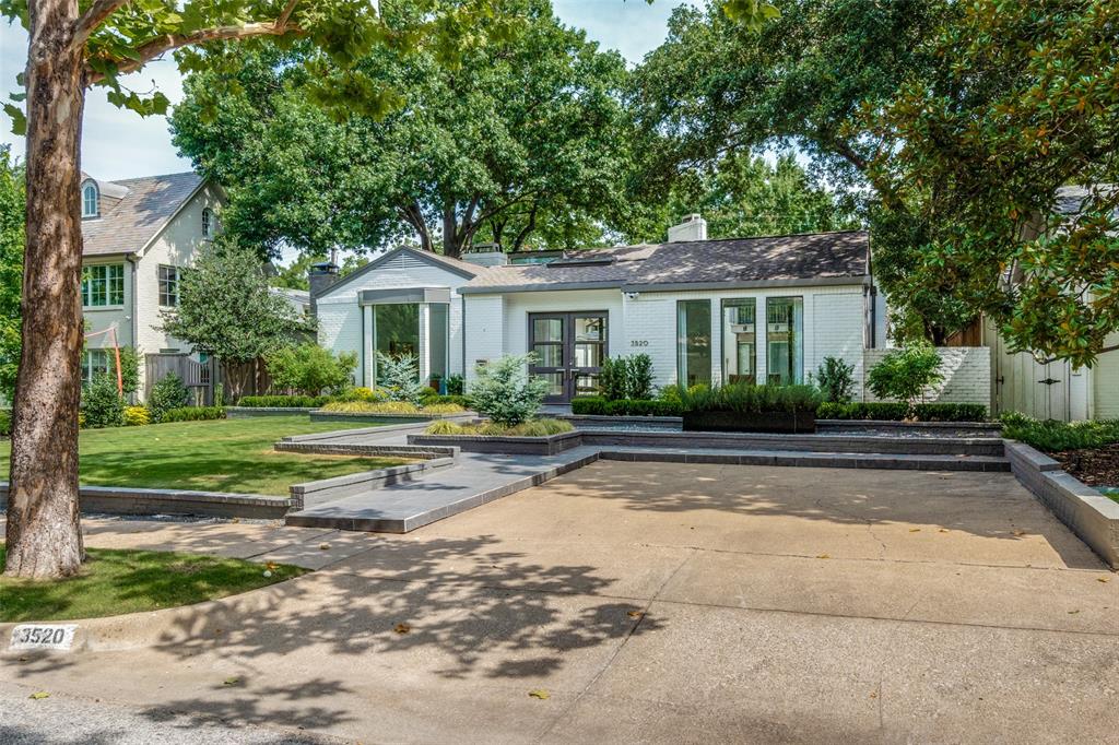Step into modern luxury in this meticulously renovated Mid-Century gem in Highland Park. Reimagined from 2018-2023, the home seamlessly blends iconic style with contemporary comfort. Sleek concrete floors and floor-to-ceiling windows throughout allow for amazing natural light. The first floor includes three living areas, a beautifully wallpapered dining room, and a wet bar that set the stage for effortless entertaining, a chef's kitchen with brand new appliances, and two downstairs bedrooms.  Upstairs, the primary suite includes a private balcony overlooking the pool and back yard, and there are 2 additional bedrooms and a large play room or media room. Sonos fills the home, while the redesigned front yard and backyard pool paradise with limestone deck and turfed lawn create an entertainer's dream. Steps from Armstrong Elementary and in the heart of Highland Park, this beautiful home offers it all.