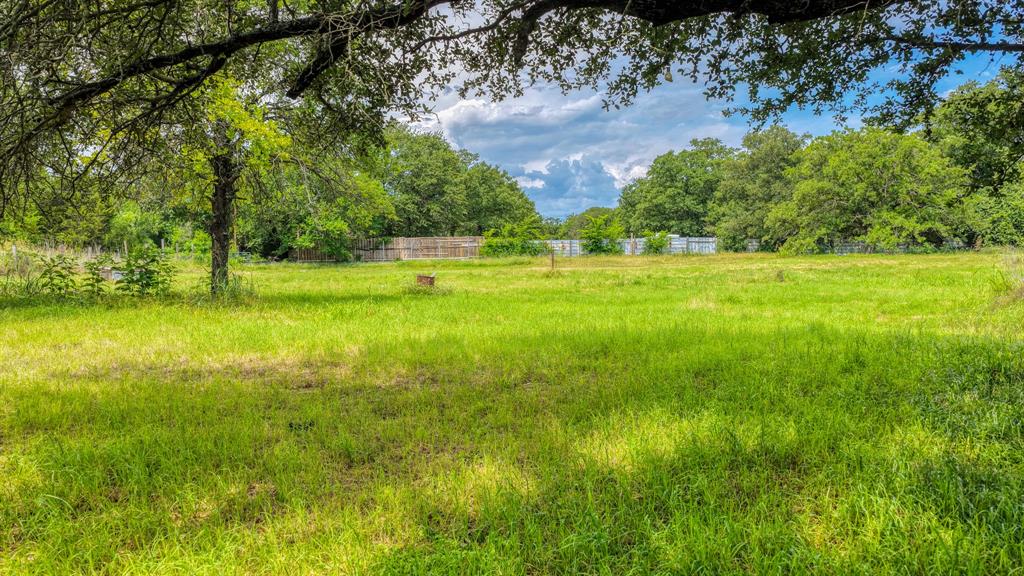 2 Lots side by side, Buy one or both!  Wide lot with multiple build sites available! Enjoy open land dotted with beautiful trees, all while benefiting from NO CITY TAXES & NO HOA! Conveniently located just 5 minutes from Azle amenities including Eagle Mountain Lake and a quick 35 minute commute to downtown Fort Worth. Animal enthusiasts will love the freedom to bring horses & cattle! Bring your own builder or choose from custom plans with our preferred Zeal Home Builder or opt for semi-custom homes, including Barndominiums! Still deciding on your dream home? You can invest now and build later, with no time limit to build. Explore financing options with Veteran Land Board Loans or low-down conventional options. Don’t miss out on this opportunity. These rural homesites are ideal for you to own your piece of one of the fastest growing counties in Texas. Don’t wait to buy land, buy land & wait! Txt keyword ZEAL8 to 88000 for more details.