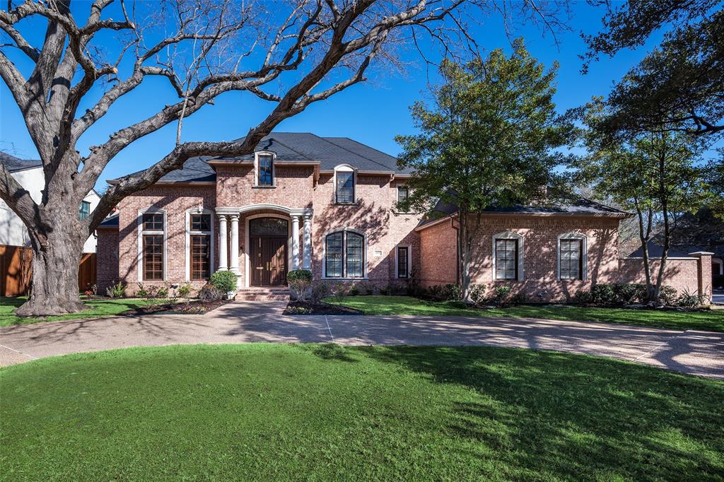 Situated on a oversized (112x150) interior corner lot in the heart of prime Preston Hollow, this stately traditional residence offers an ideal blend of timeless architecture, generous scale, and thoughtful updates by designer, Robin Minter. Open, flowing floor plan is enhanced by soaring ceilings and abundant natural light, creating an inviting atmosphere throughout. Multiple living and dining spaces provide exceptional flexibility for both everyday living and entertaining, including a stunning great room with vaulted ceilings, custom built-ins, fireplace, and walls of windows overlooking the backyard. A handsome study with built-ins offers the perfect work-from-home retreat. The chef’s kitchen was updated with Jenn-Air appliances, gas cooktop, double ovens, built-in refrigerator, walk-in pantry, and a spacious island, opening seamlessly to the breakfast and living areas. The desirable first-floor layout includes a private primary suite and split guest suite. The primary suite serves as a true retreat with its own fireplace, spa-like bath with dual vanities, soaking tub, walk-in shower, oversized walk-in closet and separate workout room (or terrific second closet location). Upstairs, there are three additional bedrooms each with an ensuite bath and a large game room with built-ins and window seating. Designed for year-round enjoyment, the backyard features a heated pool and spa, grassy play area, and side grassy yard – perfect for pets or young children to keep separate from the pool area. Extensive updates include: brand new roof (2026), refinished and added hardwood floors, fresh interior and exterior paint, updated pool finishes, high SEER HVAC systems, 3 new water heaters, smart security cameras, app-controlled sprinkler system, and a full-yard mosquito misting system. A rare opportunity to own a beautifully maintained and thoughtfully upgraded home in one of Dallas’ most sought-after neighborhoods that is close to the city’s finest shopping, dining and schools.