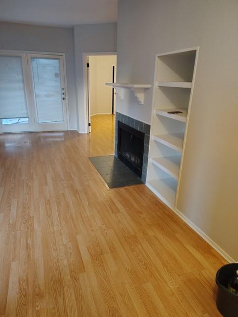 Motivated Sellers - AC Unit and Dishwasher recently replaced. Washer and Dryer combo convey with sale - Fantastic location with quick access to the Tollway, I-635, and Hwy 75. This updated first-floor unit offers a private patio overlooking the pool. Nicely appointed one-bedroom floor plan featuring laminate flooring throughout, a slate-tiled shower, and a kitchen with granite countertops. Additional highlights include a cozy fireplace, two generous closets, and an in-unit stackable washer and dryer. Move-in ready and perfectly situated within the community.