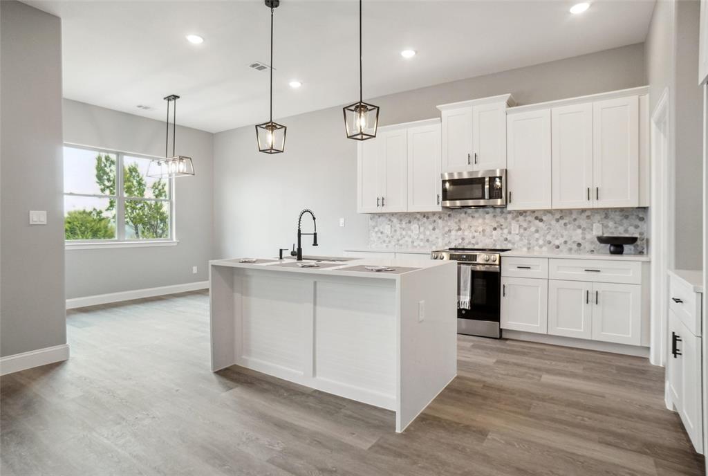 GATED & GUARDED COMMUNITY*NEW CONSTRUCTION BY BLUE RIBBON HOMES*2 POOLS*2 TENNIS COURTS*CLUBHOUSE*2 BOAT RAMPS*ACCESS TO LAKE GRANBURY*SWIMMING, BOATING & FISHING*1-STORY BEAUTY*LARGE BACKYARD W-COVERED PATIO*LOT IS 120x60, APPROX .21 ACRE WOODED LOT*CITY WATER & SEPTIC *QUALITY CONSTRUCTION*QUARTZ COUNTERS*KITCHEN W-WATERFALL ISLAND, GE APPLIANCES, COFFEE BAR, WALK-IN PANTRY W-STORAGE & SHELVING*4-BURNER ELECTRIC RANGE*42-INCH WHITE CABINETRY W-BLACK PULLS*STAINLESS SINK*LAUNDRY ROOM W-QUARTZ COUNTERS,SINK*PROPELLER FANS & LUXURY WATERPROOF VINYL FLOORING*LIVING ROOM WITH REMOTE ELECTRIC FIREPLACE, STONE SURROUND & HEARTH*FIREPLACE CAN EMIT HEAT OR PROVIDE AMBIANCE*OPEN FLOOR PLAN*3 BED, 2.5 BATHS*LOVELY PRIMARY SUITE WITH ELEGANT BATH,STAND-ALONE TUB, HUGE SHOWER W-FRAMELESS GLASS*OVERSIZED CLOSET*HOA $308 YR*2 CAR GARAGE W-SINGLE DOOR*ATTIC PULL-DOWN*CEILING FANS THROUGHOUT*SEE 360 TOUR*