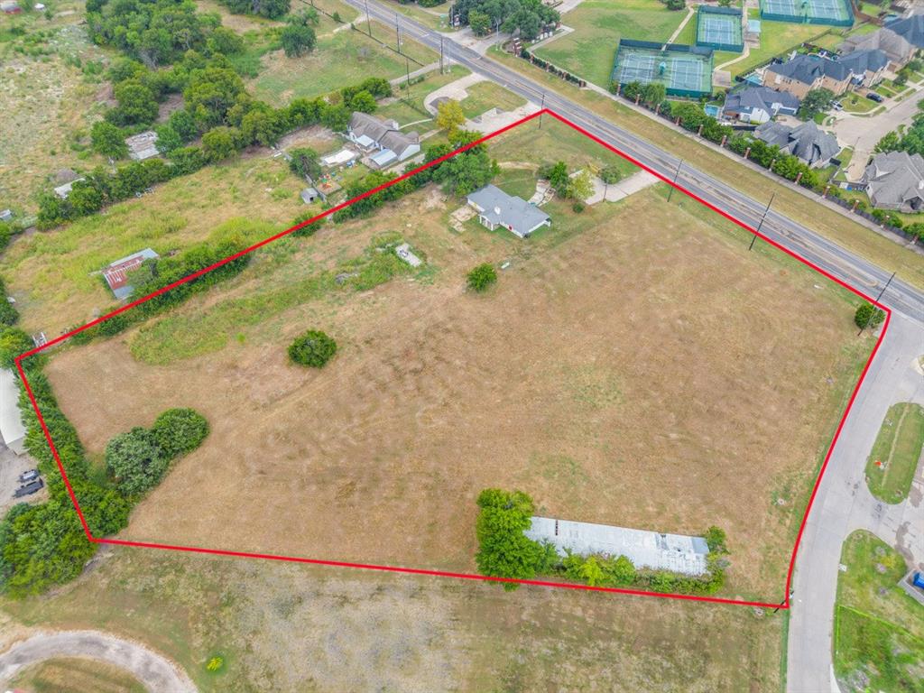 4.80 Acres on this Busy Corner Location with 2 Lots Combined. This is an Amazing Location for a Medical Practice, Dental, Retail Strip, Restaurant or any business. Being Sold For Land Value. Buy one (2.308) tract or both (2.491) to include 4.80 Acres. Demo the 2115 SF building or remodel. The corner lot includes a green barn at 2832 SF at the back. Close to Presbyterian Hospital, Pullen & Cain School and across from Buffalo Creek Subdivision and Golf Course. Quick access to Hwy 30 & HWY 205. Buyer and Buyer's agent to verify all info. There are 2 parcels at this address & Ranch Trail. 
Mls# 20948088 and 20948158.