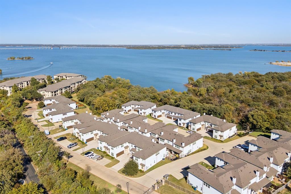 Tucked along the vibrant shores of Lewisville Lake, Water’s Edge is a mid-rise condominium community that combines modern design with the tranquility of nature, all while keeping urban conveniences just minutes away. Nestled amidst a forest of trees with magnificent lake views and a waterfront deck, you’ll love coming home to Water’s Edge. Built by Crescent Estates, Water’s Edge offers five thoughtfully designed floorplans, ranging from 2,087 to 2,372 square feet, with options for 2 or 3 bedrooms, plus flexible spaces like game rooms, studies, or lofts to suit your lifestyle. The final move-in-ready units are now available! Residents enjoy exclusive amenities, including a lakefront clubhouse, a fitness center, and community pool. Plus, these condos are Fannie Mae approved, making the path to ownership even smoother. Whether you're drawn by the natural beauty, the sophisticated finishes, or the vibrant community feel, Water’s Edge is where lakefront dreams come true. 126 Bridgewater Way #38 features the Catalina floorplan. *Color selection and finishes may vary by unit.