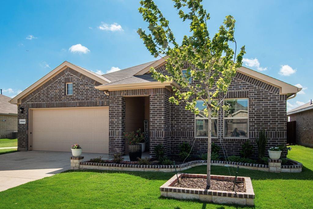 Beautiful 4-2-2 with nice covered back patio and view of pond.  Large family room with plenty of wall space for furniture.  Open kitchen with gas range, microwave, dishwasher, and big island.  Refrigerator will remain.  Gutters added around the house, 2 inch blinds, fans in all bedrooms, extra electrical circuits in the garage, big farm sink with sprayer faucet, upgraded shower head in master bath, wainscoting on the guest bath wall.  Custom landscaping and brick-stone flowerbed border.  Washer and dryer can stay with a full price offer.  Better than new and priced to move quickly!