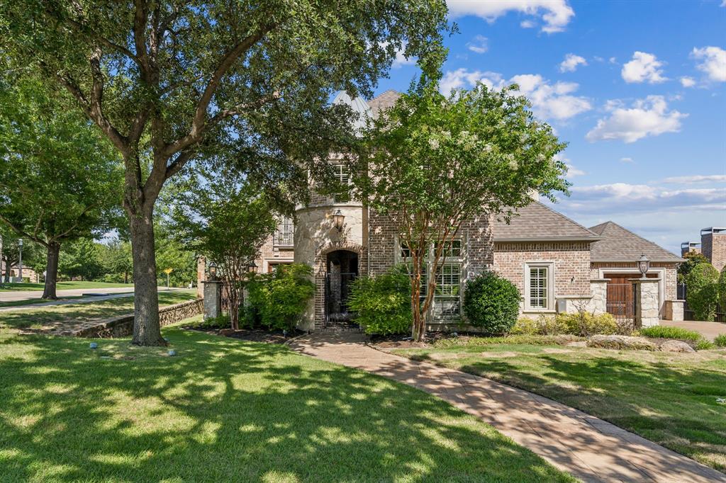 Welcome to an entertainer’s paradise situated on a premium corner lot spanning nearly .4 acres. This beautifully appointed Darling home combines timeless brick and stone architecture with resort-style outdoor living and exceptional interior upgrades. Guests are immediately welcomed by elegant plantation shutters, rich hardwood flooring, and a private study with custom built-ins. Wine enthusiasts will fall in love with the dedicated wine room featuring iron doors, wood-planked ceiling, wet bar, wine fridge, and direct pool access. The gourmet kitchen is designed for serious cooking with a Wolf 6-burner gas range, double ovens, Sub Zero refrigerator, new Scotsman ice maker, and whole-home water filtration system. The versatile floor plan includes a first-floor guest suite with full bath, a luxurious primary retreat, and multiple entertainment spaces. Upstairs, the game room with wet bar and adjacent media room create the ultimate gathering space, while spacious secondary bedrooms provide room for everyone. One bedroom currently serves as a craft room, and the custom furniture and rug will convey with the home.
Step outside to enjoy your private backyard oasis featuring a sparkling chlorine pool, brand-new chiller heater system (2025), gas fire pit with stone seating, and a one-year-old hot tub that stays. With a dedicated pool bath, oversized lot, mature landscaping, and a 3-car garage, this home was designed for making memories year-round.