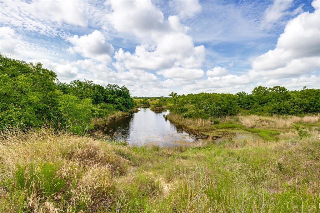 Welcome to Anthony Ranch, a stunning high-fence ranch in Northern Fannin County. 301 acres of versatile North Texas land offering an exceptional combination of ranching, recreation, hunting, and investment potential. Property features rolling terrain, numerous ponds, approximately 60% open pasture and 40% tree cover, creating an ideal balance for livestock operations and wildlife habitat. 

The ranch is fully enclosed with 8-foot game fencing, making it an ideal property for serious hunters focused on habitat improvement and strict wildlife management. The ranch’s seven ponds provide reliable water for livestock, wildlife, and fishing, while Sand Creek along the northern boundary adds scenic appeal and enhances habitat diversity. Together, the ranch’s water features, rolling terrain, native cover, and open grazing areas support both abundant wildlife and productive livestock operations, making this a rare opportunity.

Convenient FM Road access and nearby electricity provide accessibility while maintaining a private and secluded setting. Located near the Red River in Fannin County, this multi-use property offers flexibility for cattle operations, recreational enjoyment, income-producing opportunities, or long-term land investment. Don’t miss this rare offering of prime North Texas hunting and ranching property.