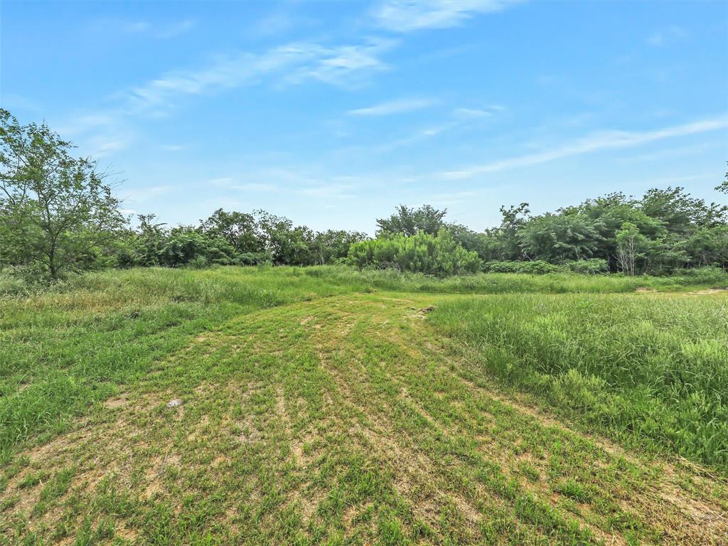 Incredible opportunity to own nearly 7.5 serene, tree-covered acres in the heart of Keller. Currently operating as a plant nursery-business sold separately. Ideal for a residential estate, investment, or continued commercial use. Zoned for KISD with open enrollment for Carroll ISD, close to shops, restaurants and DFW Airport. Mature trees and peaceful surroundings make this a rare find with unlimited potential. Property does have a small house on it. SOLD AS ONE...2477, 2505, 2515, 2499 Union Church Rd. AGENT TO MEET. DO NOT DISTURB SELLER OR THE BUSINESS.