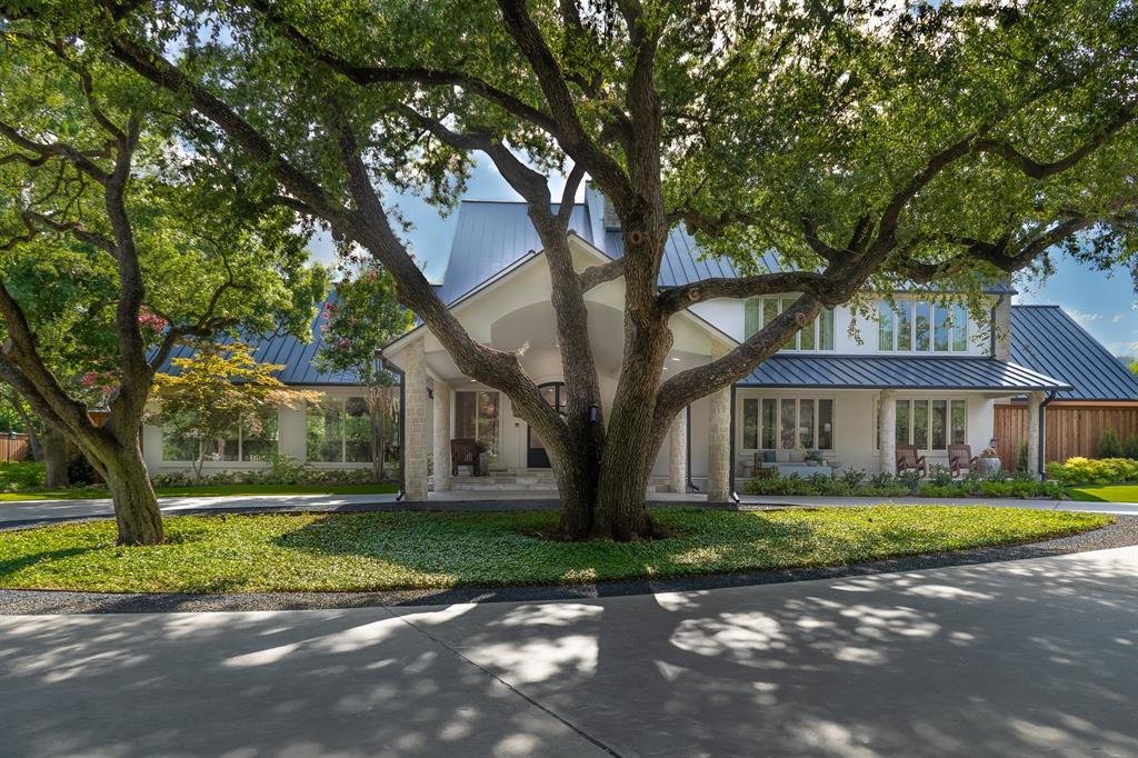 A Hill Country-Inspired Sanctuary, nestled on a gated 1.3-acre estate in one of Dallas’ most prestigious neighborhoods, has undergone a breathtaking transformation. Executed by renowned builder Robert Elliott —every detail curated to balance luxury, design, & livability. Framed by mature oaks & lush, layered landscaping, the property offers unmatched privacy, tranquility, & connection to nature. Walls of glass & expansive windows flood the interiors with natural light while deliver sweeping views of the manicured grounds, lighted oaks, & resort-style amenities. The main residence features a spacious floor plan with en suite bathrooms & walk-in closets for every bedroom, open living areas, & seamless indoor-outdoor flow designed for effortless entertaining & everyday elegance. Kitchen equipped with Wolf, SubZero, Cove, & Miele. White oak floors, custom designer lighting, museum finished walls & wallpaper throughout. Full-home AV & security by Evolve with Control4 integration for gate, speakers, & TVs. Outdoor living is elevated to an artform: a new 50' x 20' swimming pool with slide, diving board, & hot tub is complemented by travertine decks, turf-covered lawns, resurfaced sports court, in-ground trampoline, putting green, & an air-conditioned 2-story playhouse. The nearly 1,000 sqft cabana—complete with full kitchen, Lynx grill & griddle, 2 vent hoods, FP, & large entertaining island—serves as a luxurious extension to outdoor living. 7 Excel GeoThermal units with full-home heating & cooling, plus geothermal pool chiller heater, & motorized phantom screens. Whole home Generator, New sprinkler & drainage systems, & outdoor heating & lighting. Tucked into a serene, storybook setting, this home is both a private retreat & an entertainers dream. Blending Hill Country charm with modern luxury, 10427 Lennox is a rare opportunity to own a turn-key family friendly estate where architecture, comfort, & natural beauty converge. Contact listing agent for full list of upgrades.